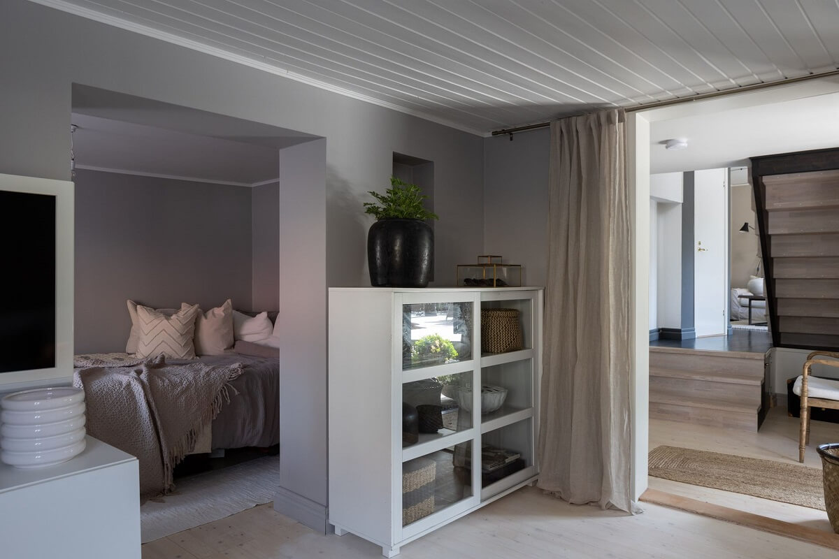 A Monochrome Nordic Home with Cozy Courtyard 18 basement-snug-bedroom-nordic-home-nordroom