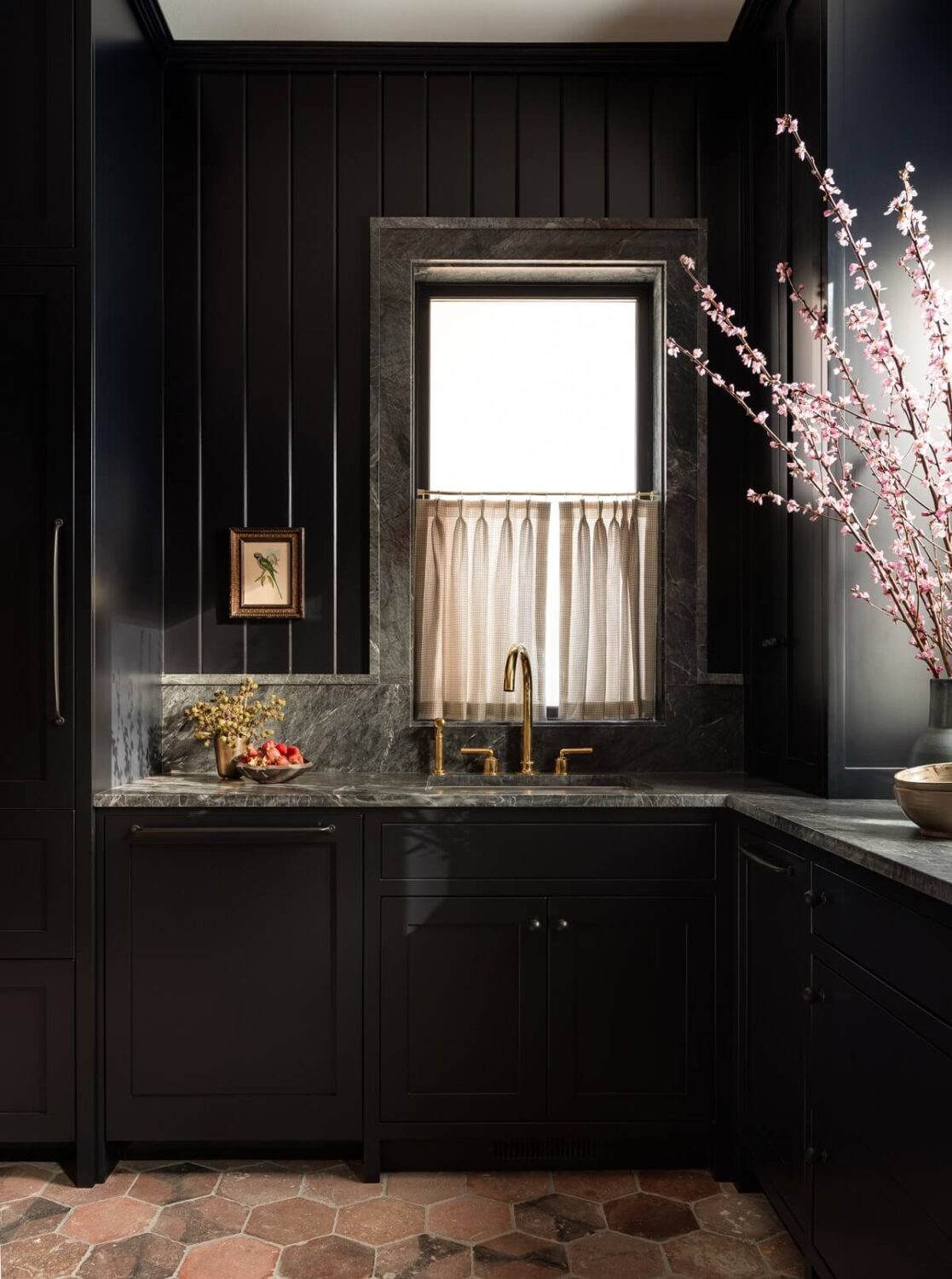 Best of 2022: Kitchens 13 black-kitchen-hexagon-floor-tiles-guesthouse-heidi-caillier-design-nordroom