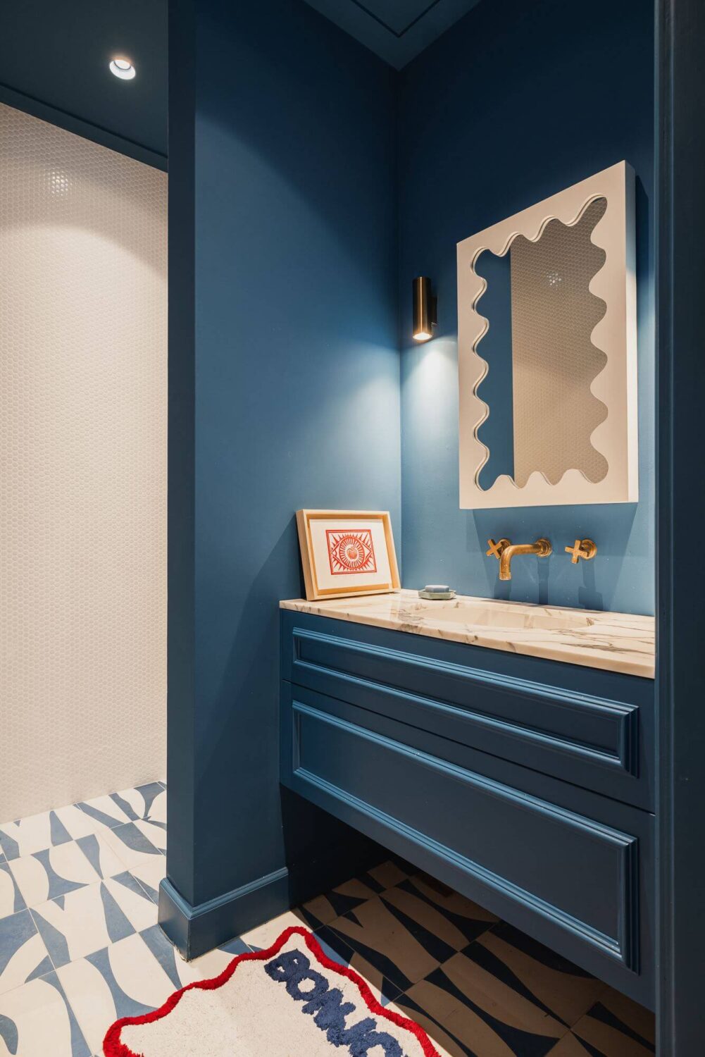 Color and Wallpaper in a Stylish Amsterdam Home 22 dak-blue-bathroom-walk-in-shower-nordroom