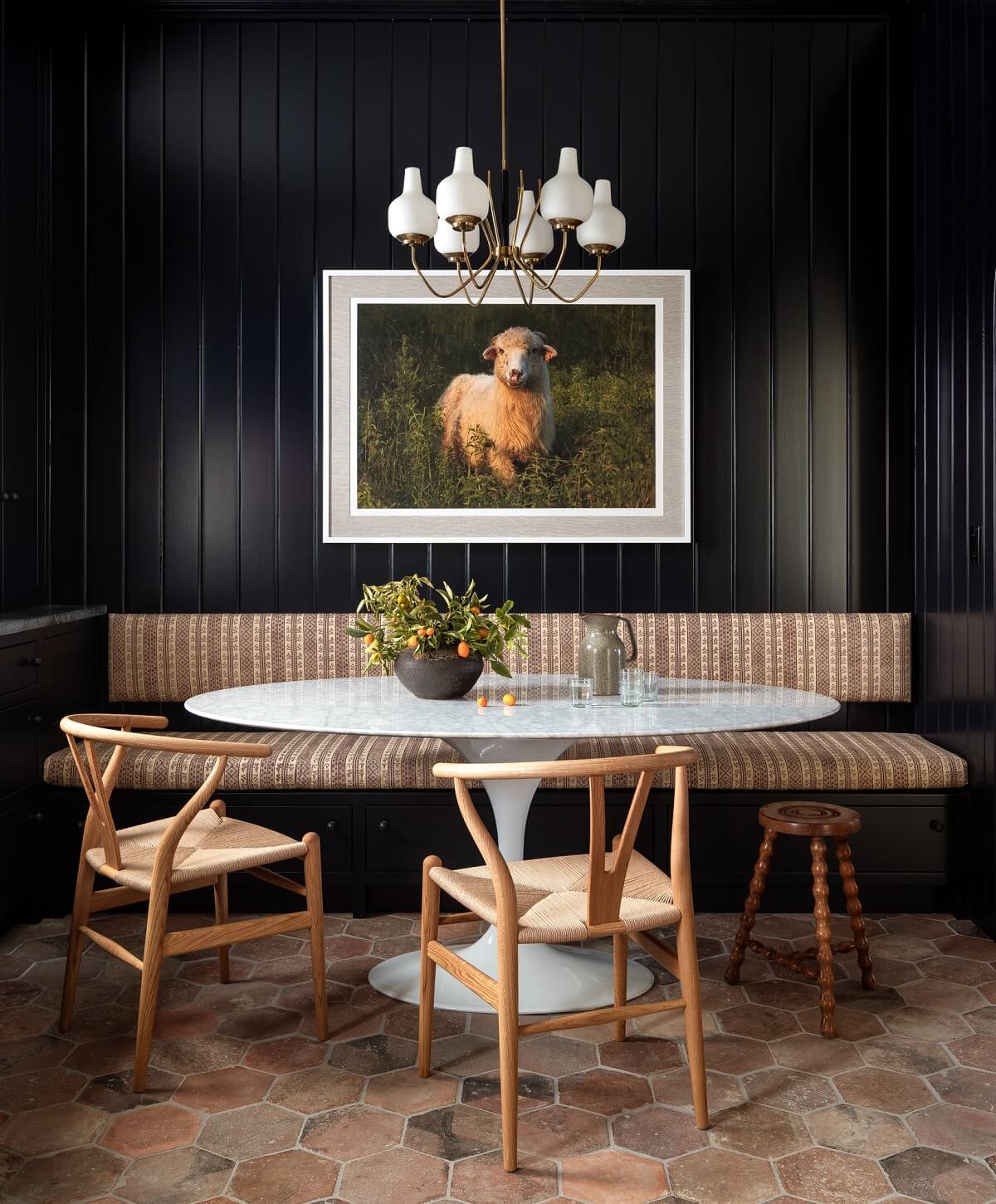 Best of 2022: Kitchens 14 moody-black-breakfast-nook-oval-dining-table-nordroom