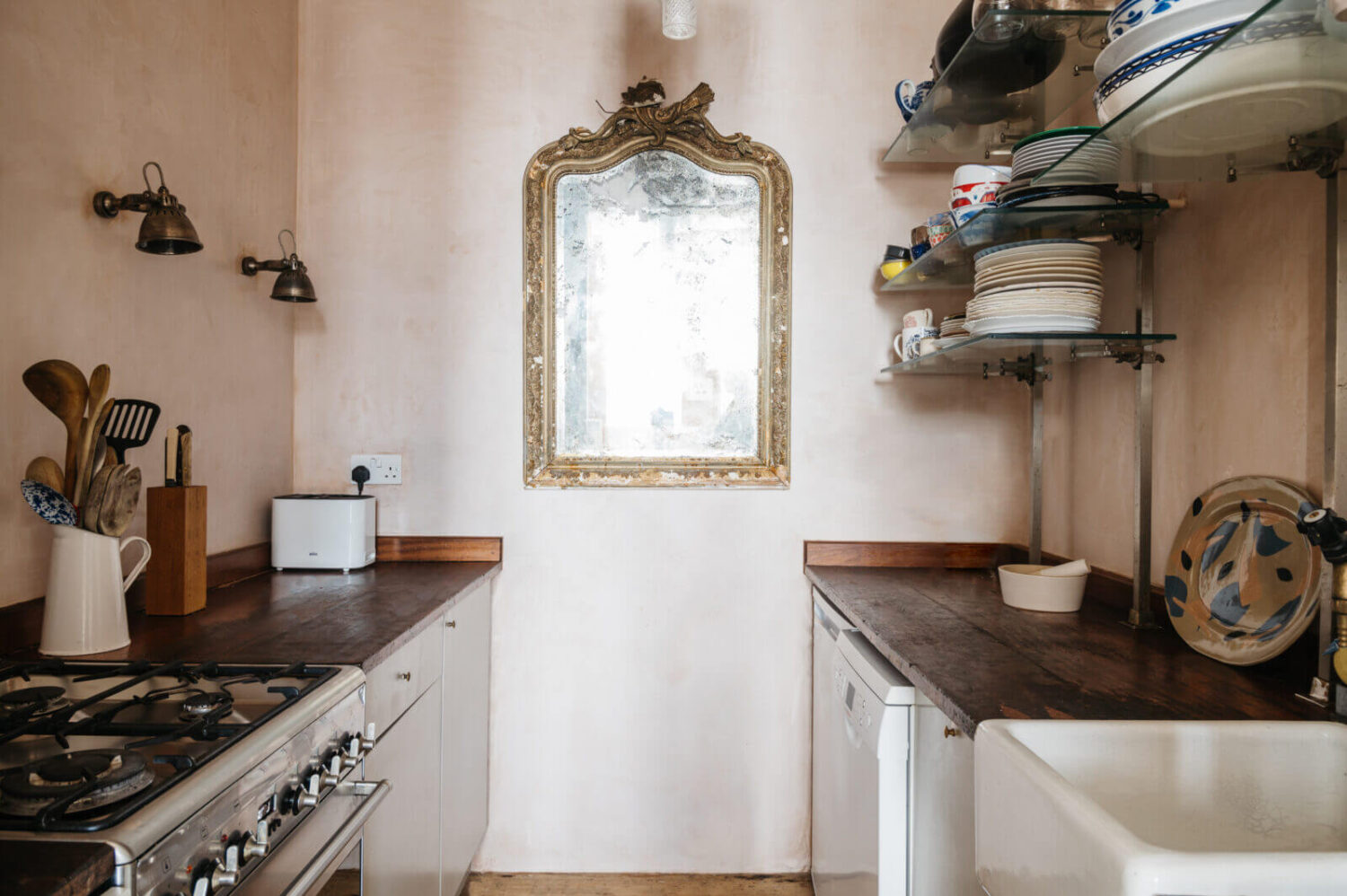 A Loft-Style Apartment with Brick Walls in London 11 small-galley-kitchen-mirror-london-flat-nordroom