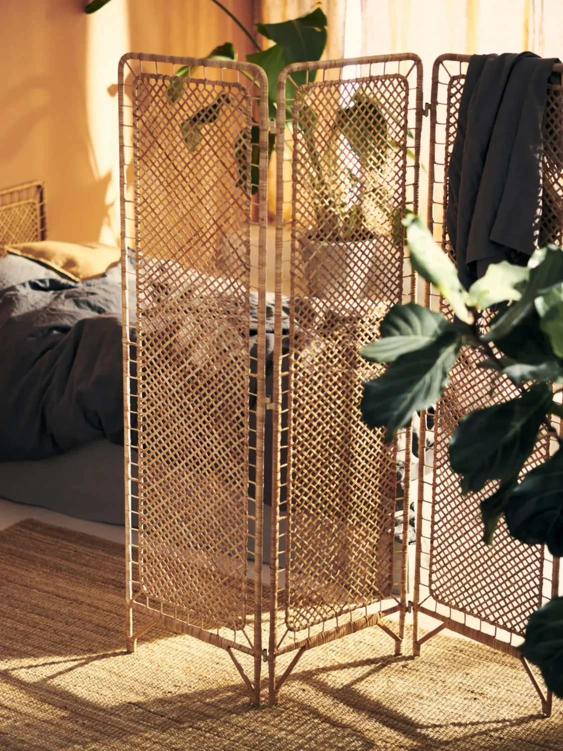 43 Ideas To Divide a Studio Apartment Into Multiple Rooms 12 ikea-tolkning-folding-screen-bedroom-rattan-nordroom