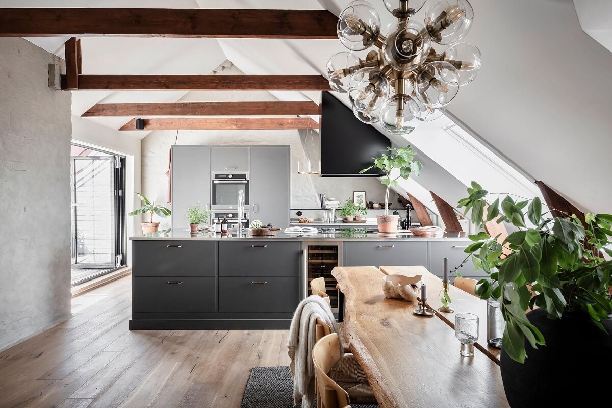 social-kitchen-space-slanted-ceiling-stainless-steel-nordroom