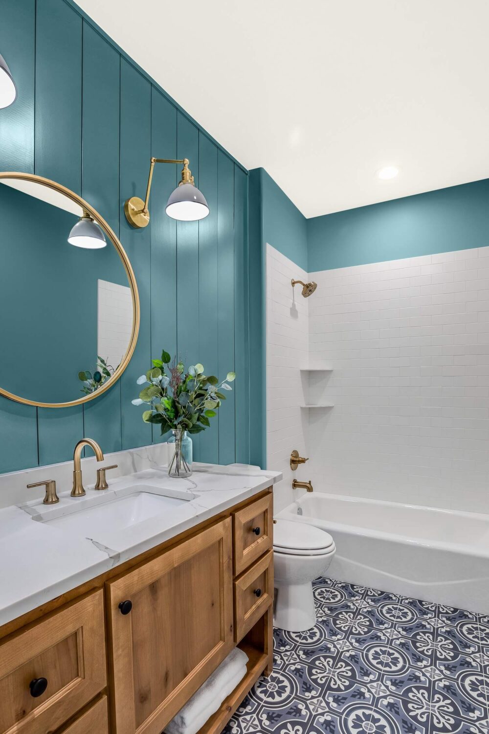 The Color Trends for 2023: Rich & Warm Natural Hues 12 bathroom-teal-colored-wood-panels-round-mirror-bath-nordroom