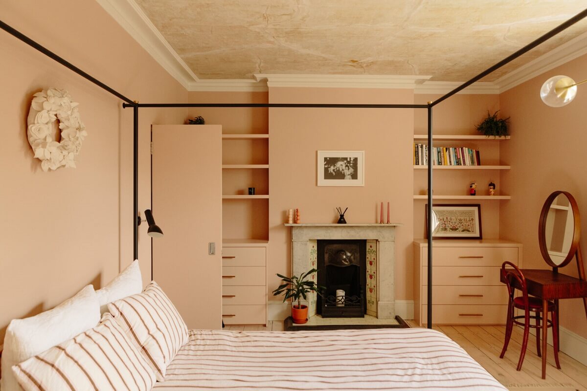 A London Home with a Cheerful Green Sitting Room 11 bedroom-canopy-bed-pink-walls-setting-plaster-fireplace-nordroom