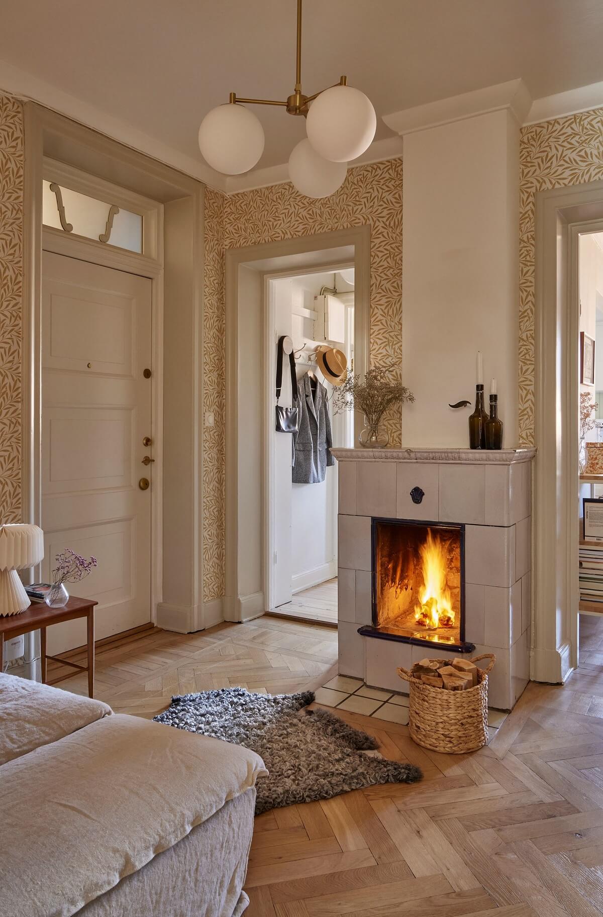hallway-tiled-fireplace-william-morris-willow-wallpaper-wooden-floor-nordroom
