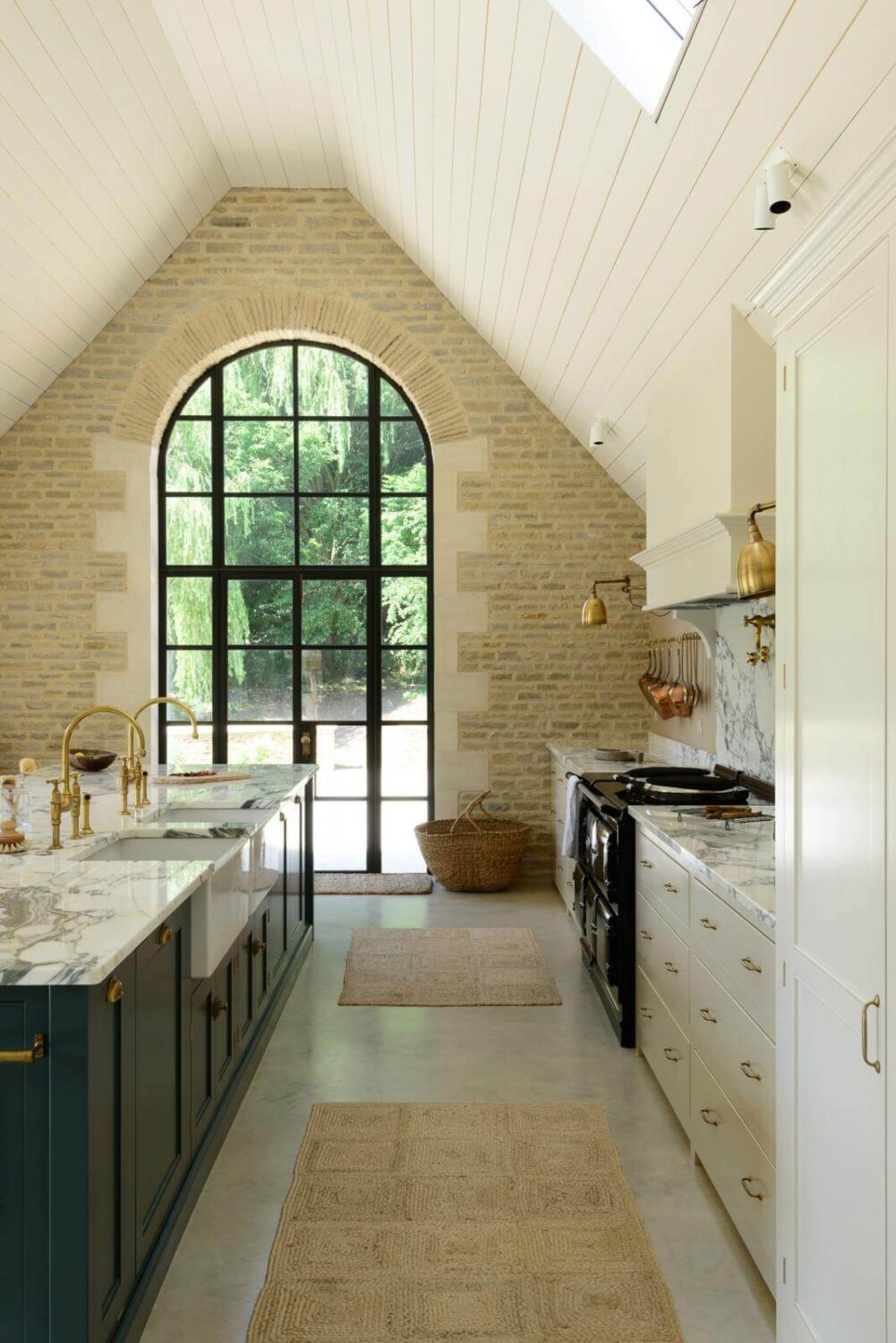 31 Practical Kitchen Flooring Ideas For Your Home 19 arched-window-concrete-floor-kitchen-nordroom