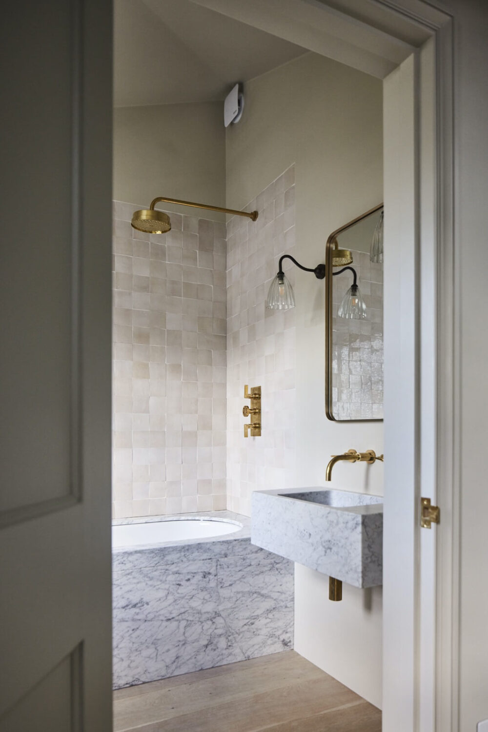 A Stylish Regency Townhouse in London 23 bathroom-marble-sink-bath-brass-fittings-nordroom