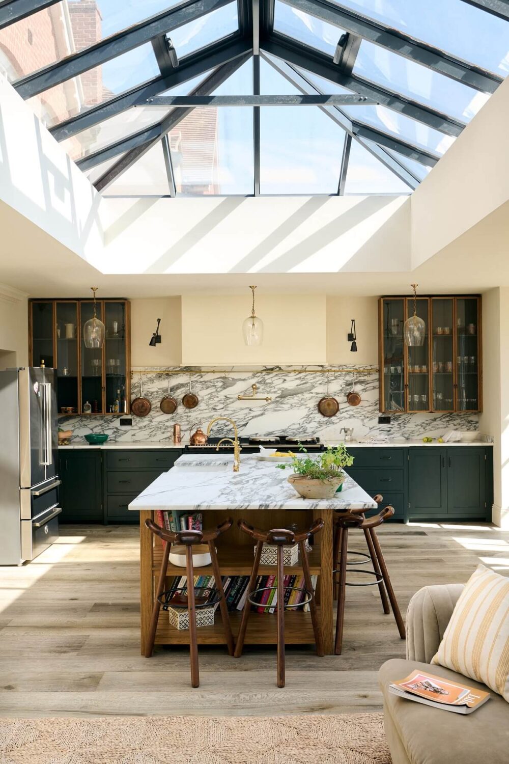 A Spacious Country Kitchen with Huge Skylight 1 devol-kitchen-island-haberdasher-shaker-cabinets-skylight-nordroom