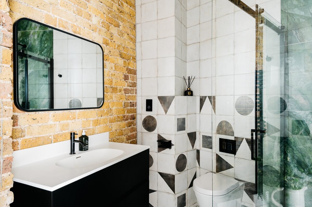 Inspiring Bathrooms With Geometric Tiles 14 industrial-style-bathroom-brick-wall-geometric-tiles-nordroom