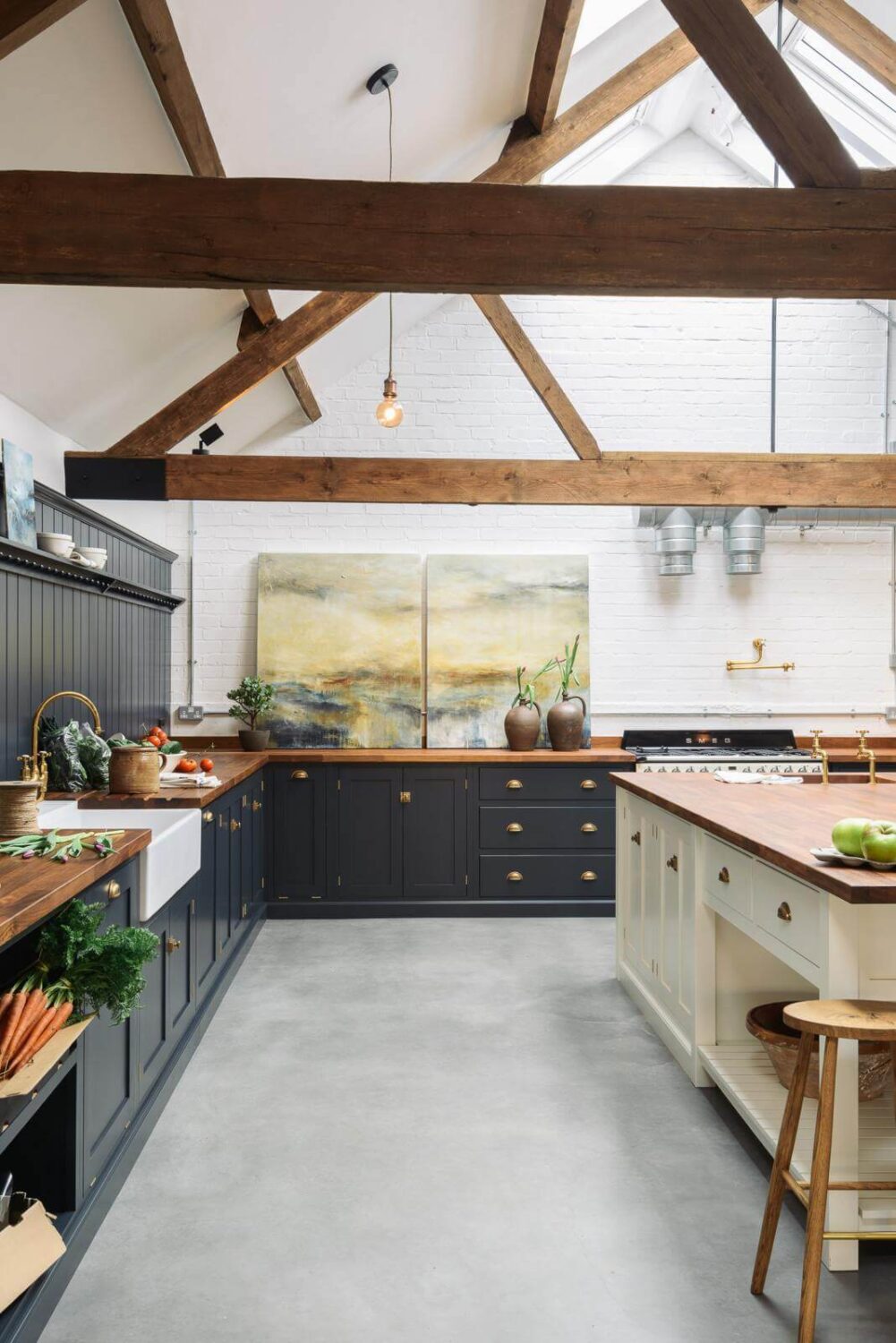 31 Practical Kitchen Flooring Ideas For Your Home 15 kitchen-concrete-floor-high-ceilings-exposed-beams-nordroom
