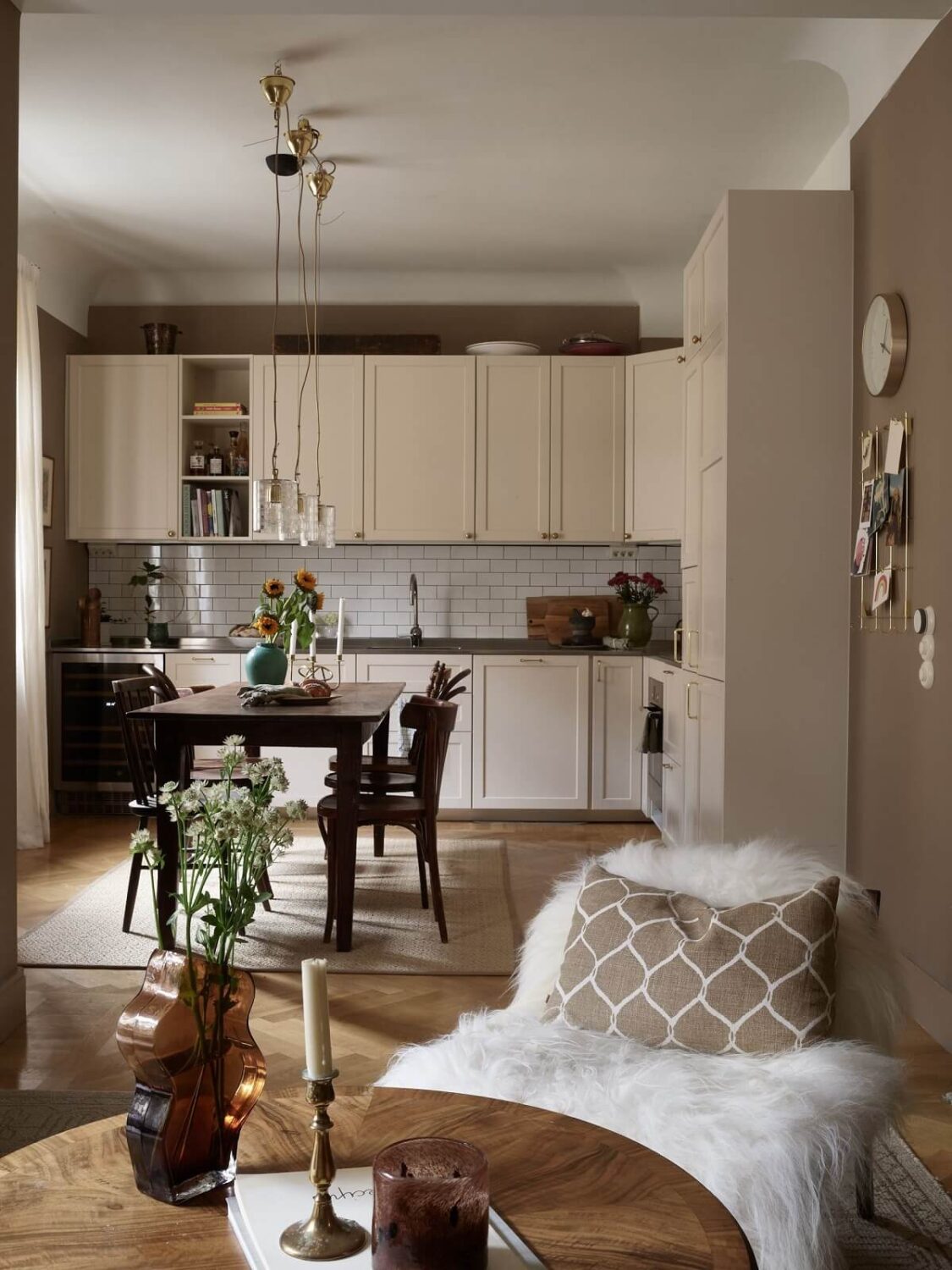 A Warm Nordic Apartment with Light Brown Walls 6 open-plan-kitchen-living-room-brown-walls-nordroom