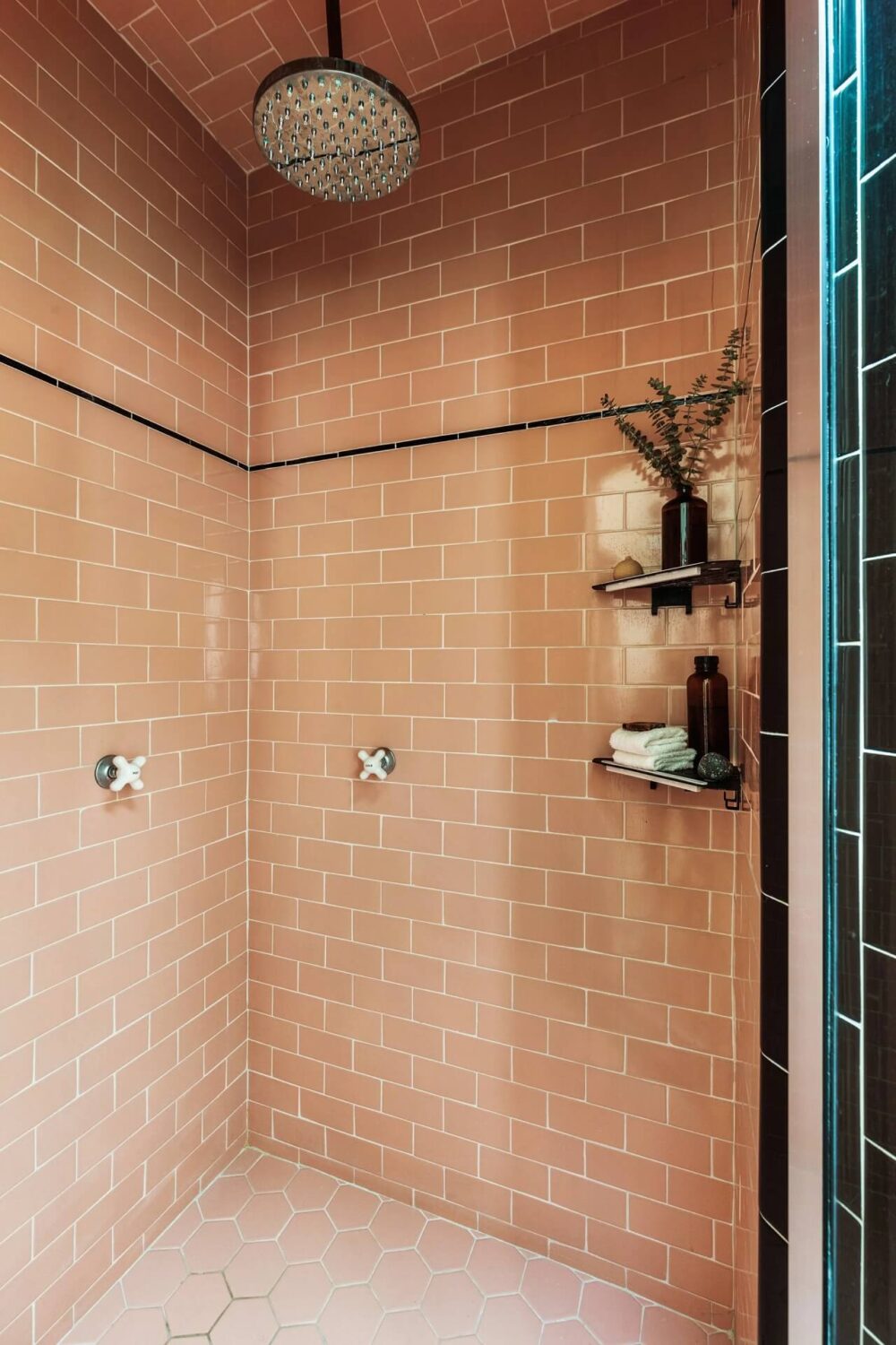 A Bright Spanish-Style Villa in Los Angeles 17 shower-pink-black-tiles-nordroom