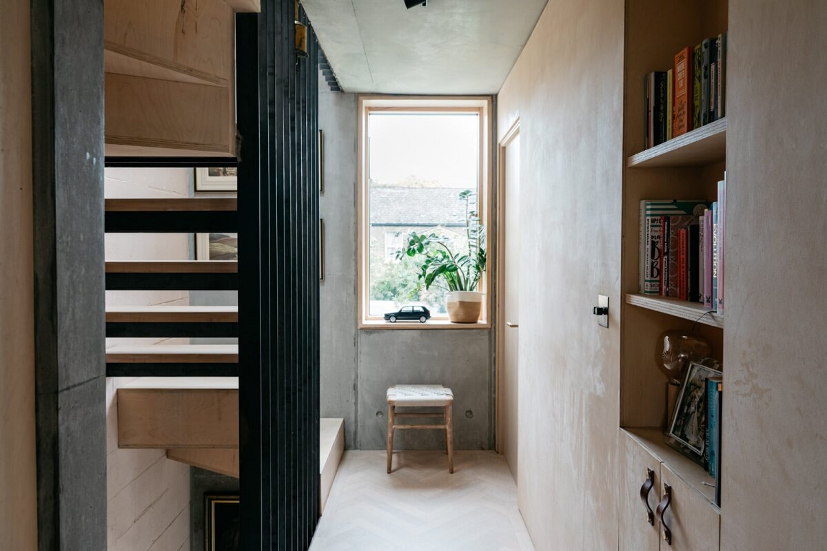 A Contemporary Version of a Victorian Terrace House 11 steel-staircase-landing-built-in-closets-nordroom