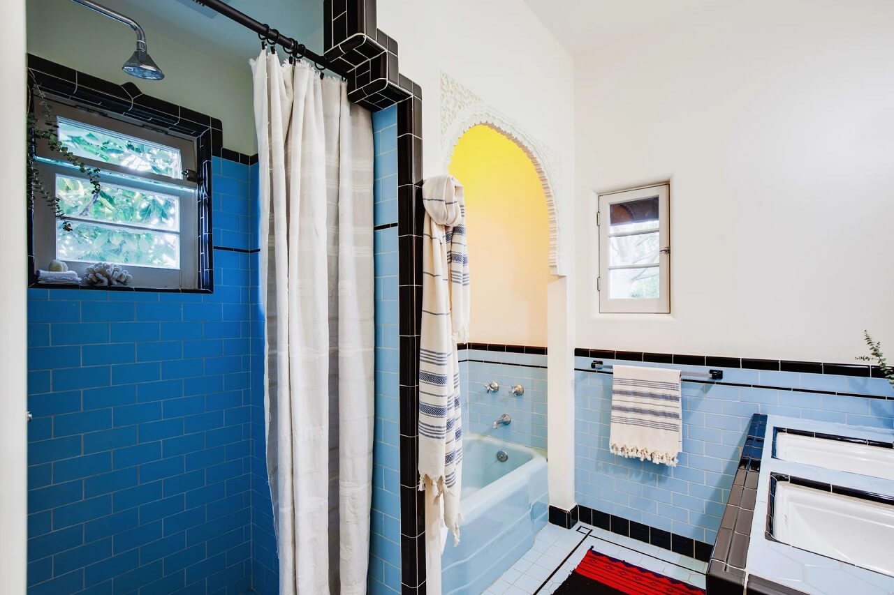 A Bright Spanish-Style Villa in Los Angeles 23 vintage-style-bathroom-blue-tiles-arch-nordroom