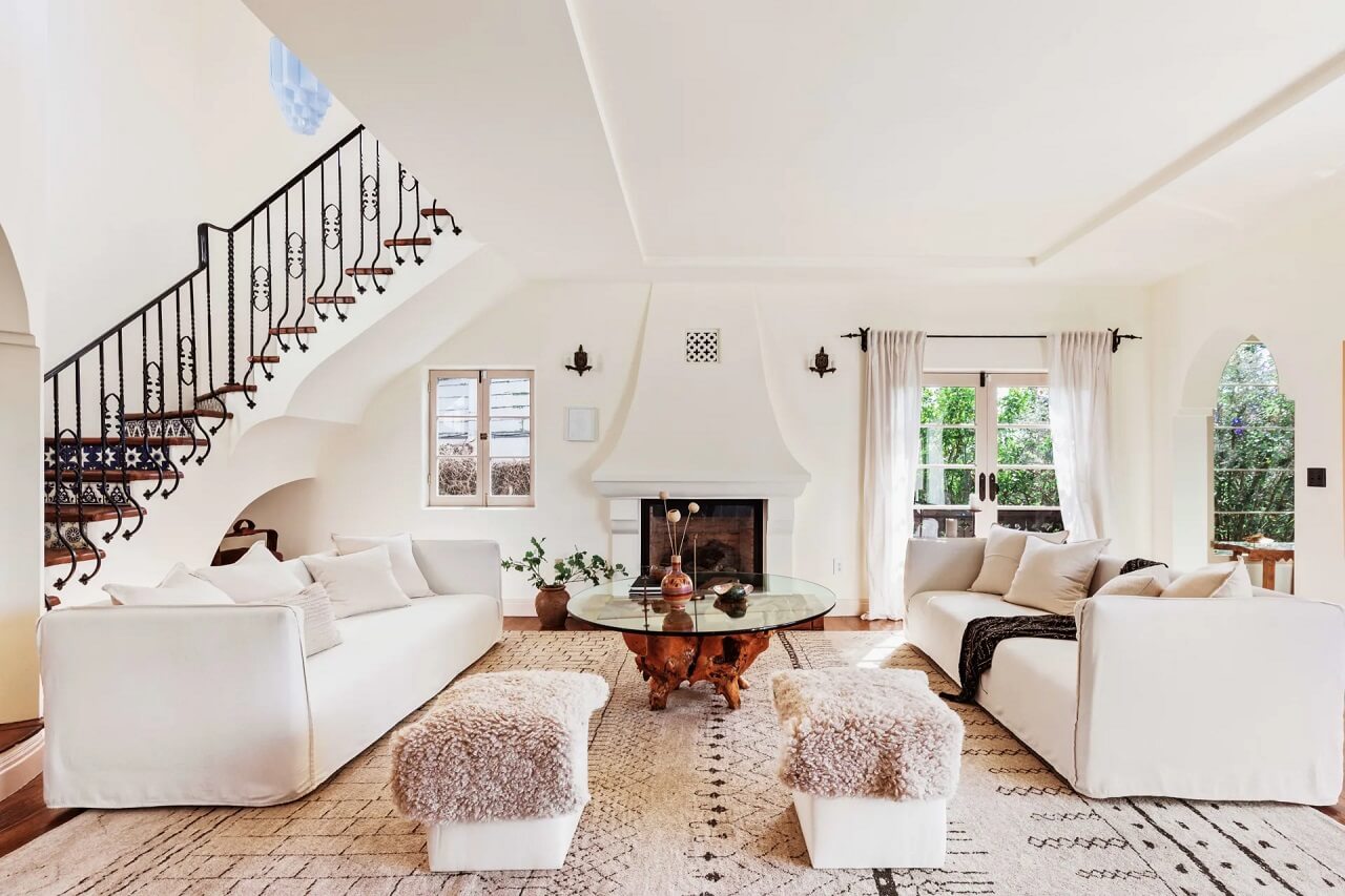 A Bright Spanish-Style Villa in Los Angeles 1 white-living-room-couch-fireplace-open-staircase-nordroom