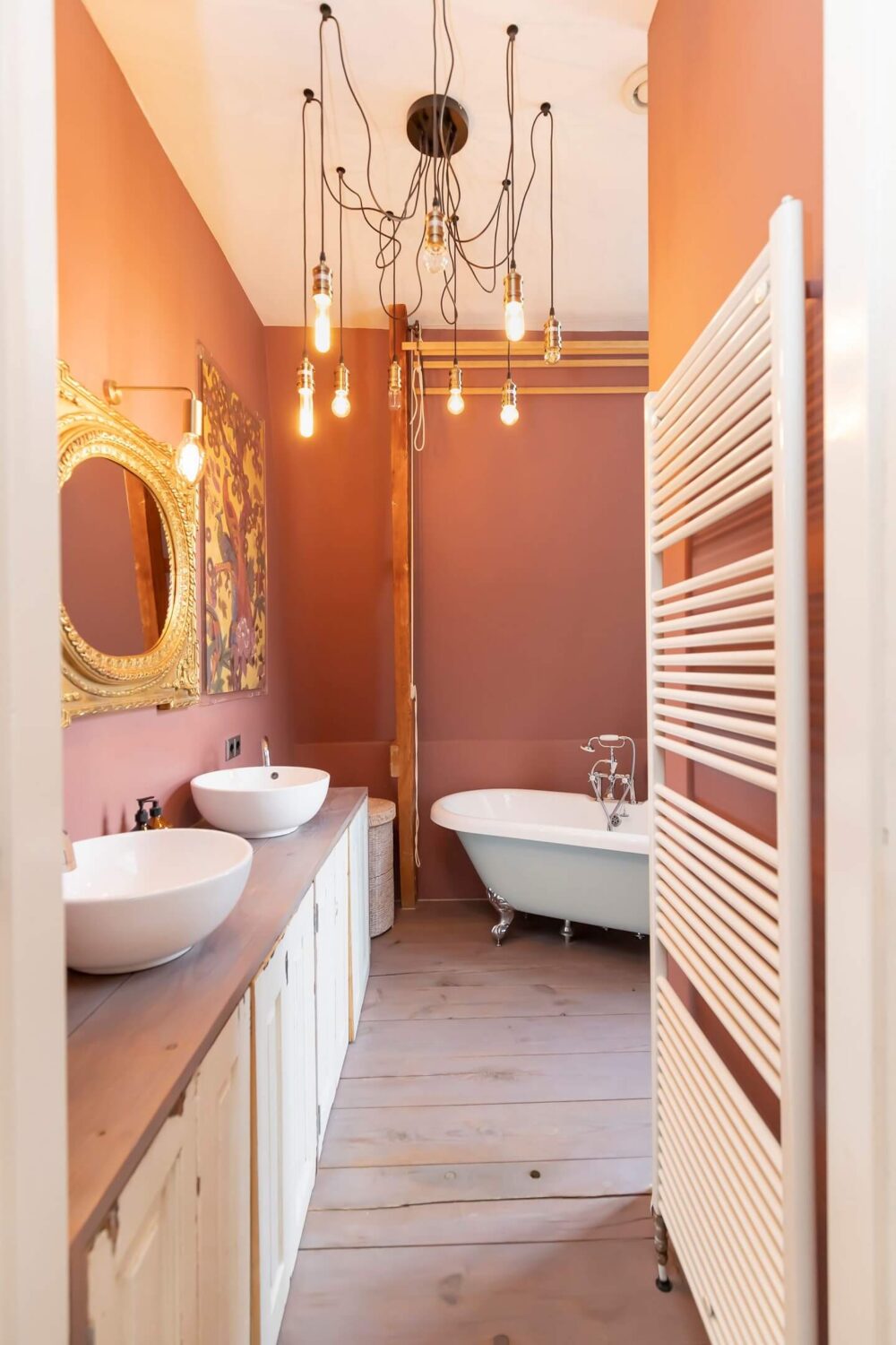A Colorful Loft in Amsterdam with Exposed Wooden Beams 17 bathroom-double-sink-freestanding-bath-earthy-pink-walls-nordroom