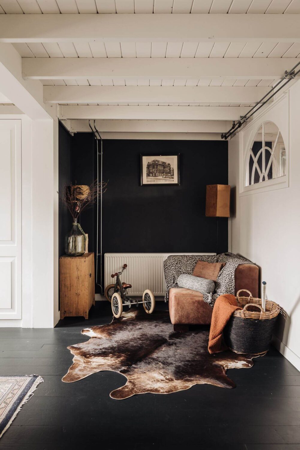 A Unique Black and White Home in a Former School Building 7 corner-seating-black-white-townhouse-nordroom