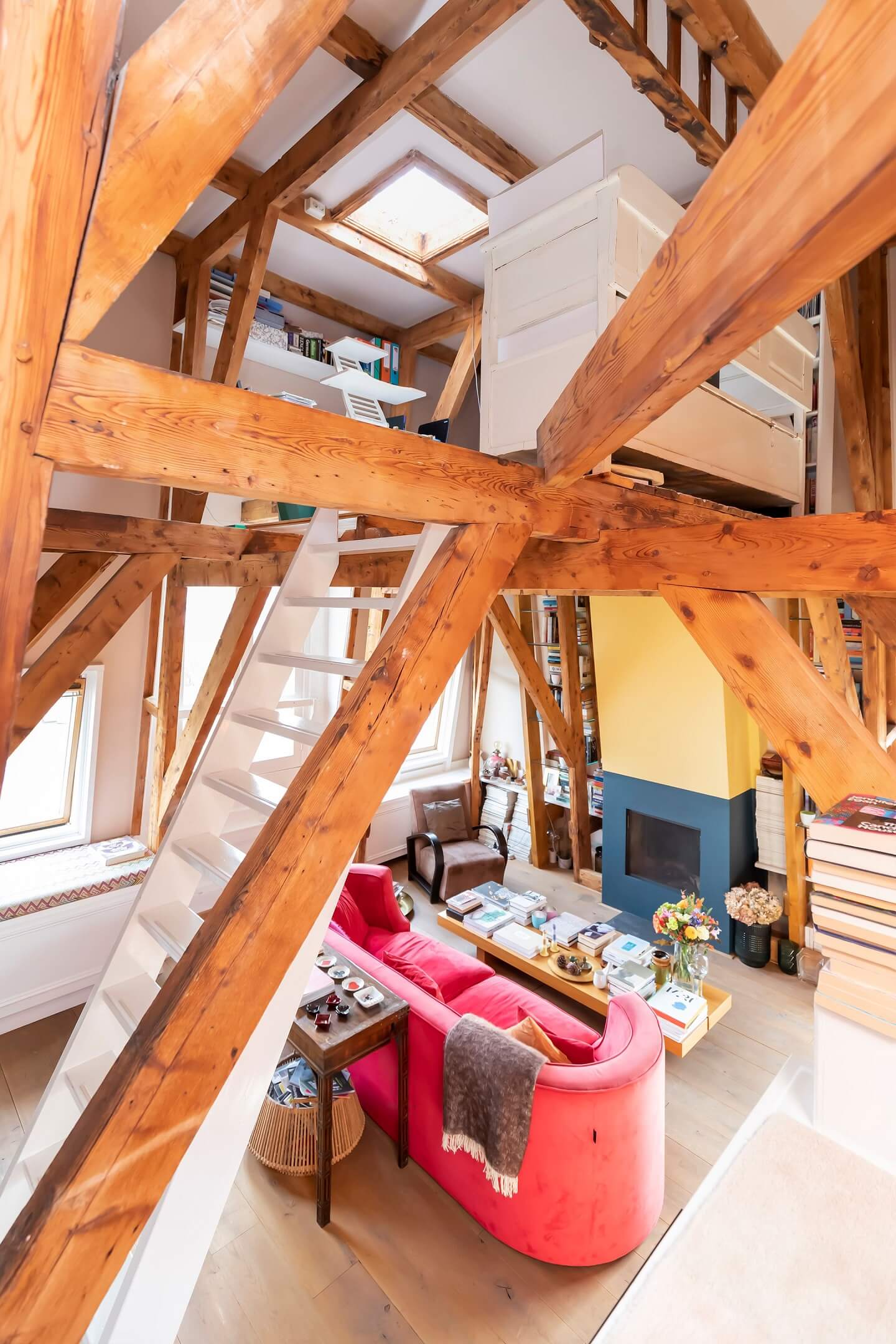 exposed-wooden-beams-colorful-loft-nordroom