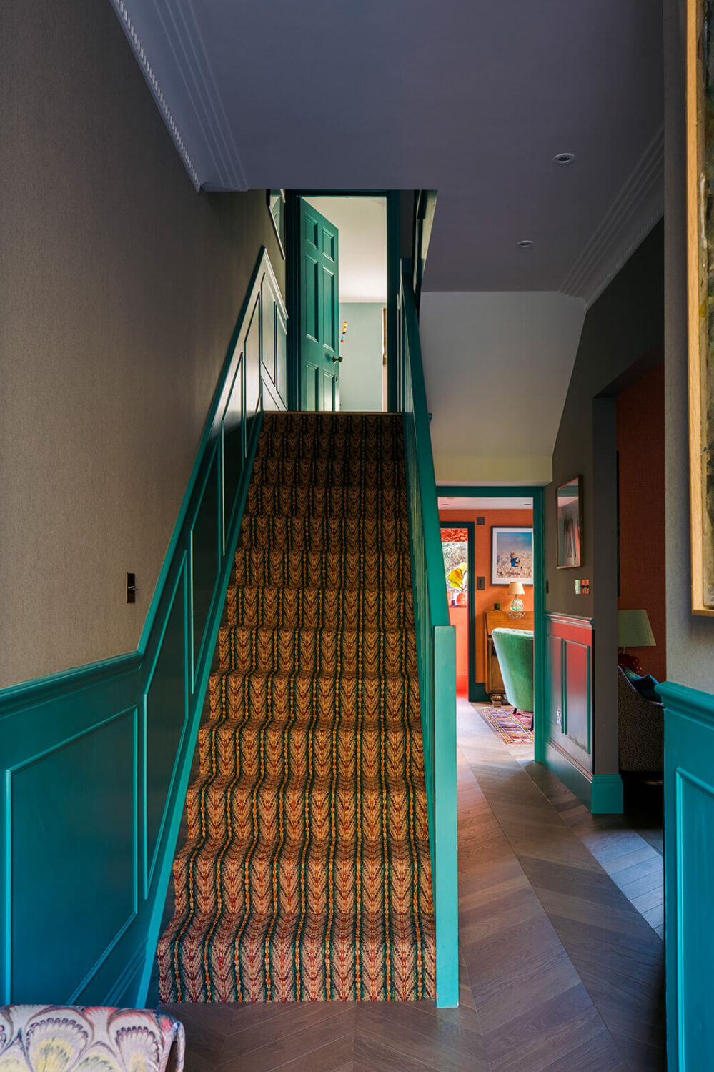 A Unique Colorful Family Home in London 8 hallway-green-paneling-chevron-floor-colorful-family-home-nordroom