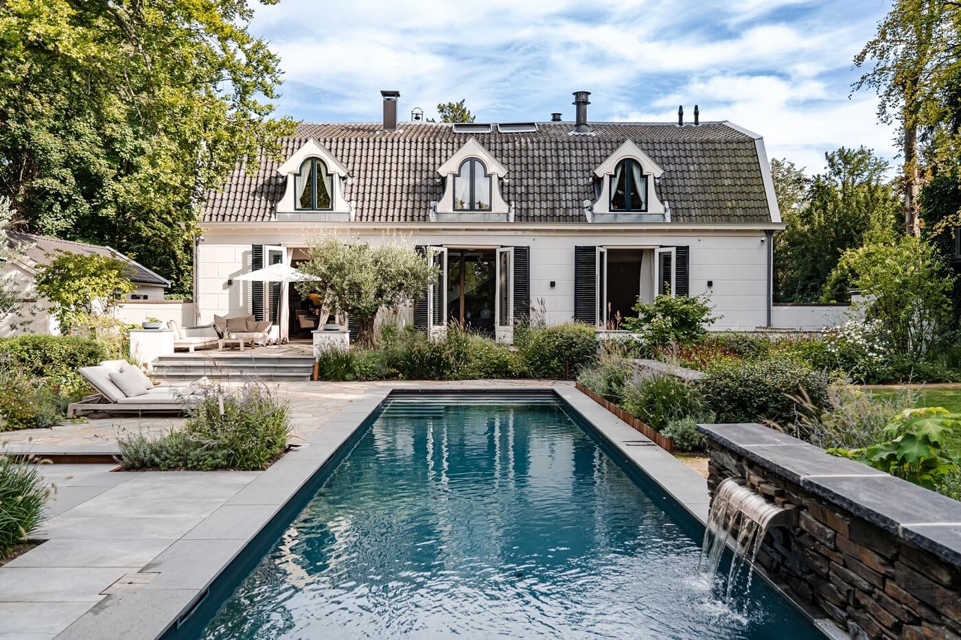 Best of 2022: Outdoor Spaces 11 swimming-pool-garden-white-exterior-dutch-carriage-housevnordroom