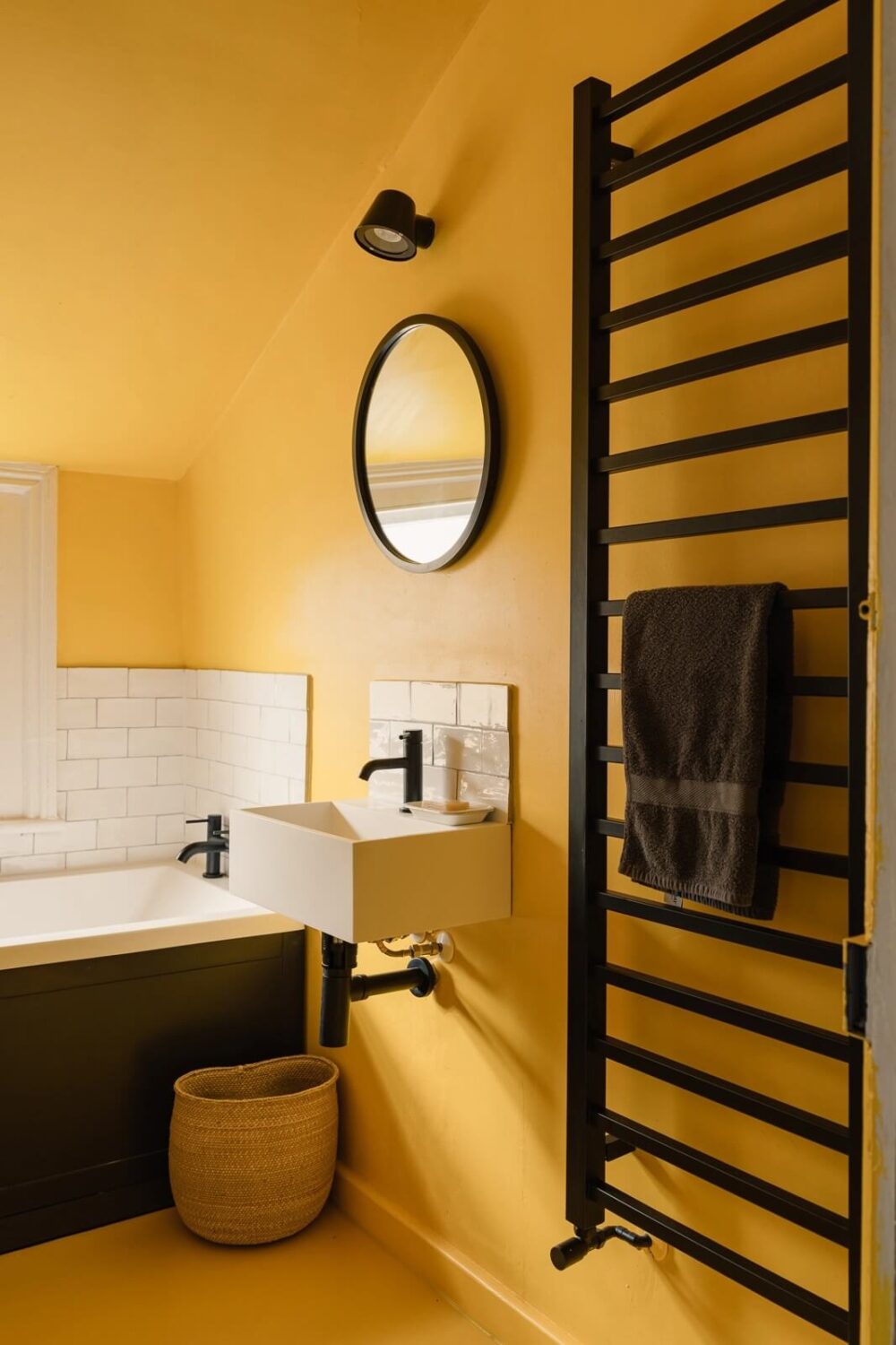 A Victorian House in London with Yellow Color Accents 21 bathroom-yellow-walls-ceiling-floor-black-fittings-nordroom