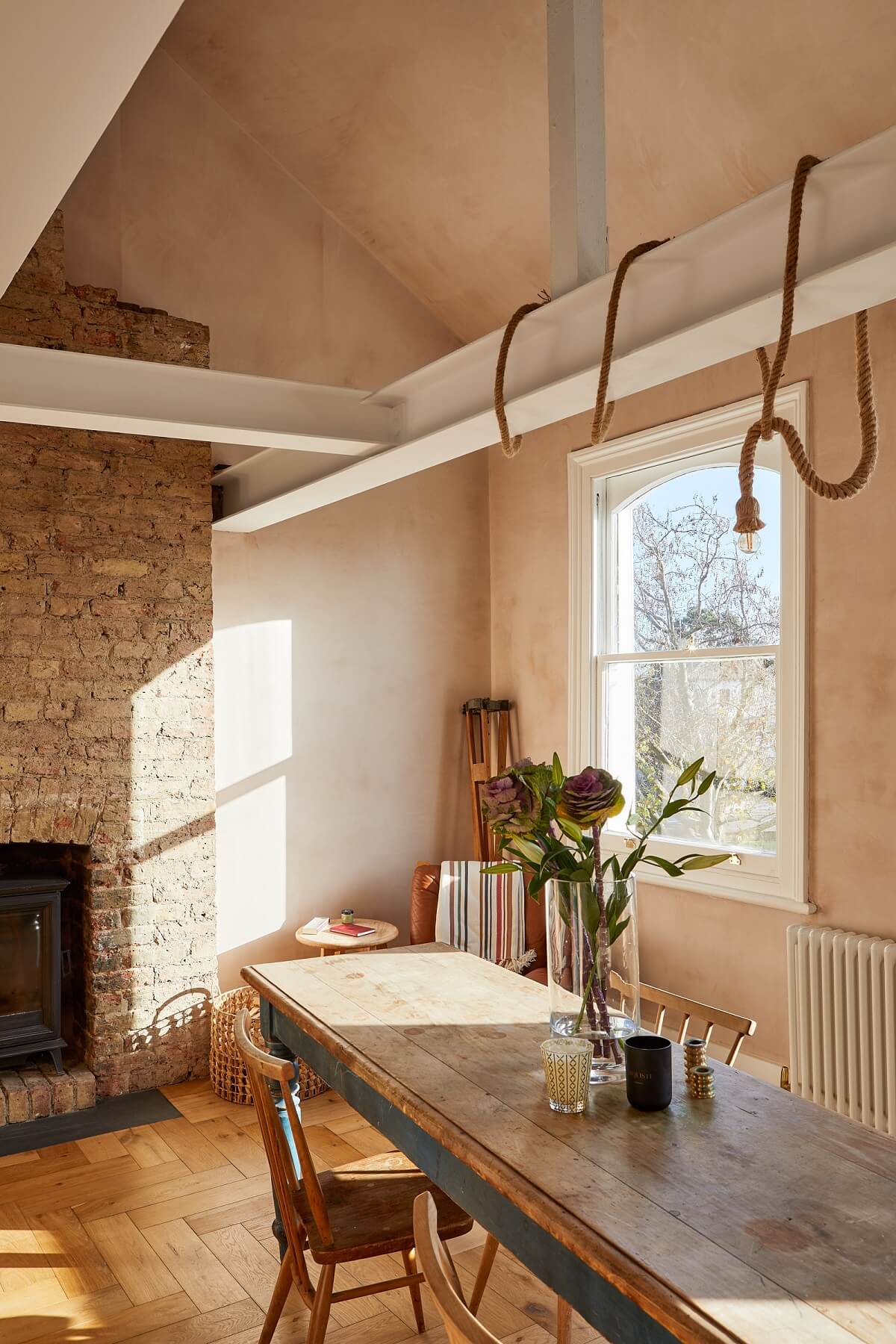 dining-room-brick-wall-fireplace-high-ceilings-plaster-walls-nordroom