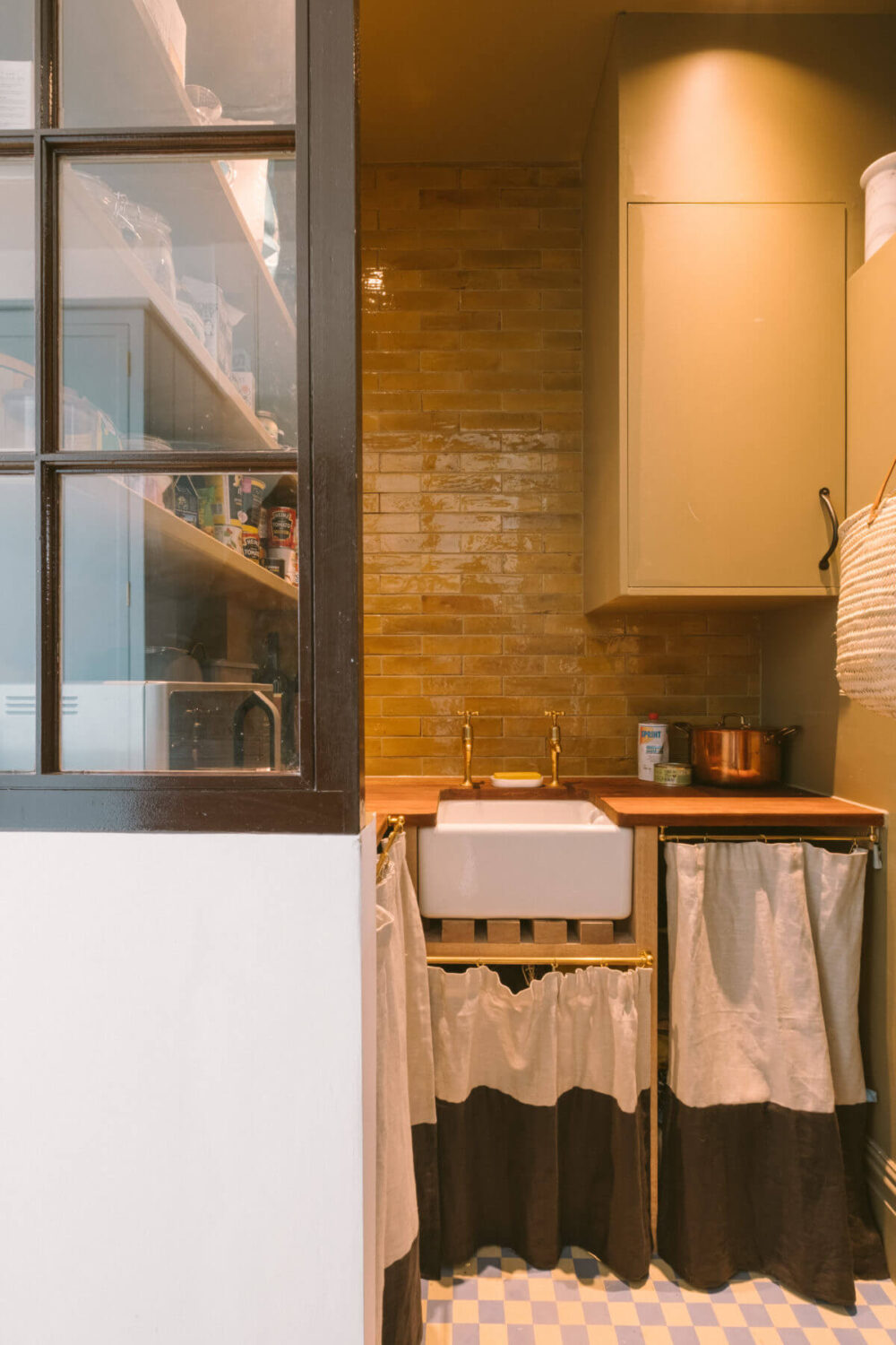 A Victorian House in London with a Blue Sitting Room 19 kitchen-pantry-utility-room-mustard-yellow-tiles-nordroom