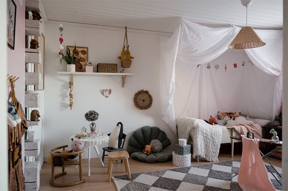 A Charming Countryside Villa in Sweden 11 kids-bedroom-checkerboard-rug-canopy-bed-nordroom