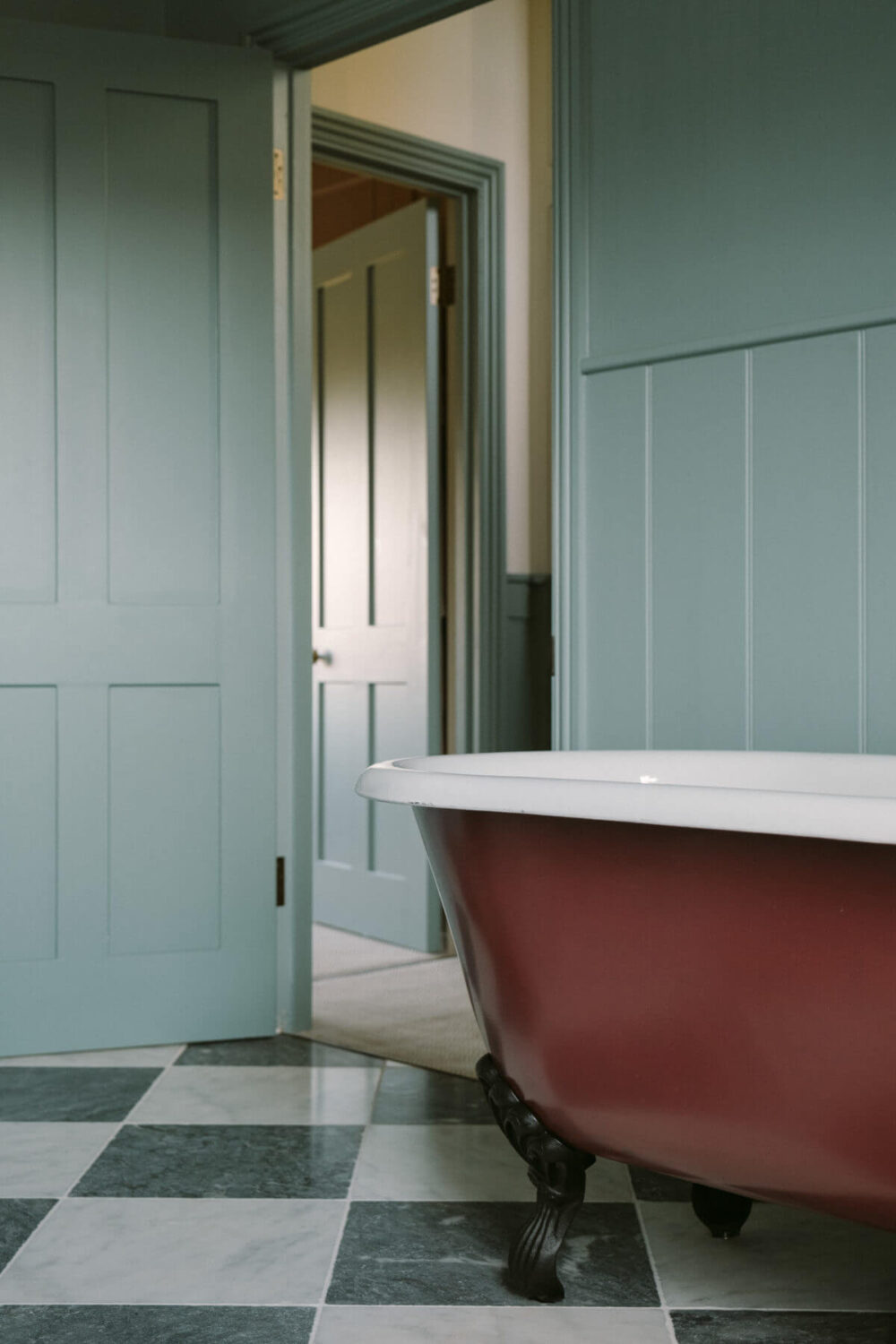 These Paint Colors Increase The Value of Your Home 3 light-blue-gray-bathroom-pink-clawfoot-bath-checkerboard-floor-nordroom