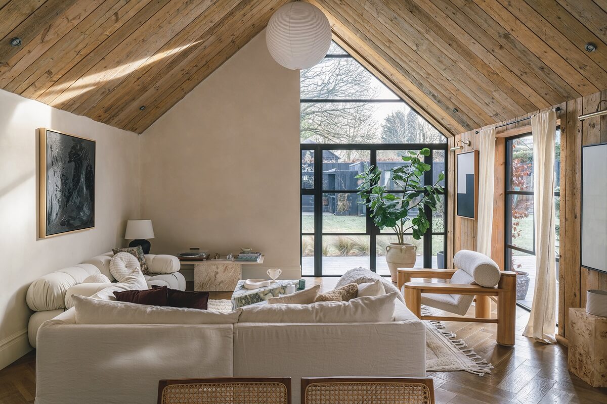 living-room-white-sofa-wooden-pitched-ceiling-nordroom