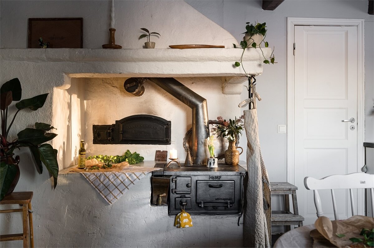A Charming Countryside Villa in Sweden 6 original-stove-country-house-sweden-nordroom