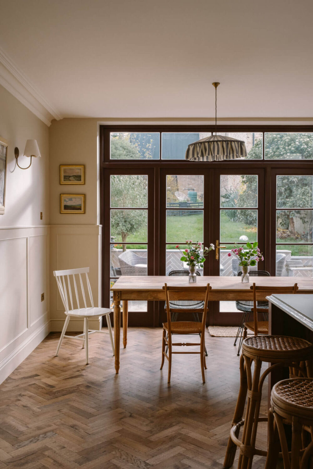 A Deep Red Kitchen in a Victorian Home in London 16 wooden-herringbone-floor-dining-space-country-style-kitchen-nordroom