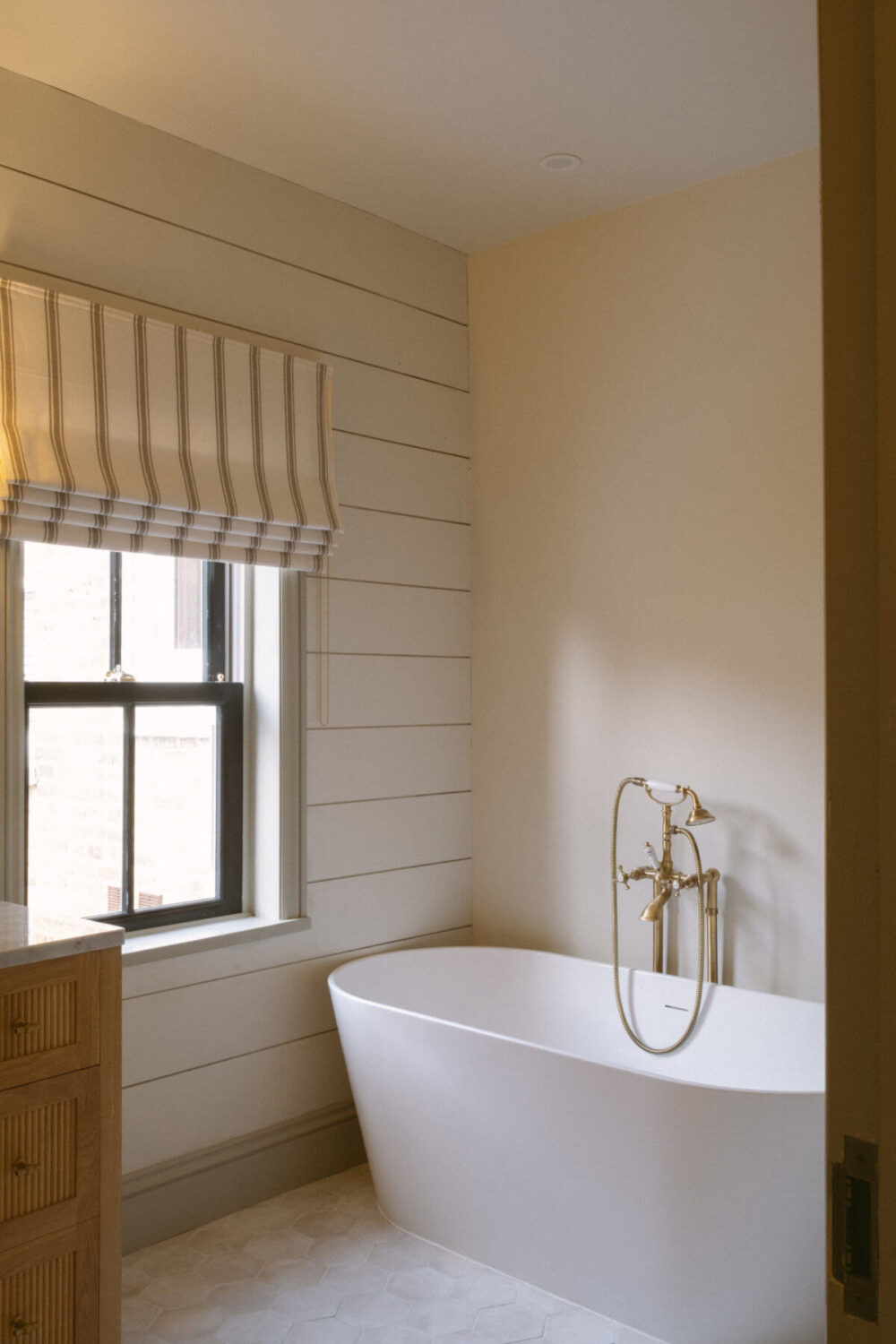 A Serene Renovated Victorian House in London 25 bathroom-wooden-wall-freestanding-bath-nordroom