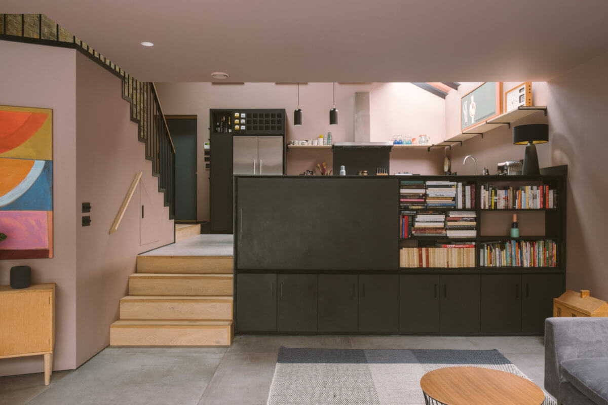 A Modern Split-Level Home with Colorful Rooms 6 living-room-built-in-bookcase-split-level-pink-walls-nordroom