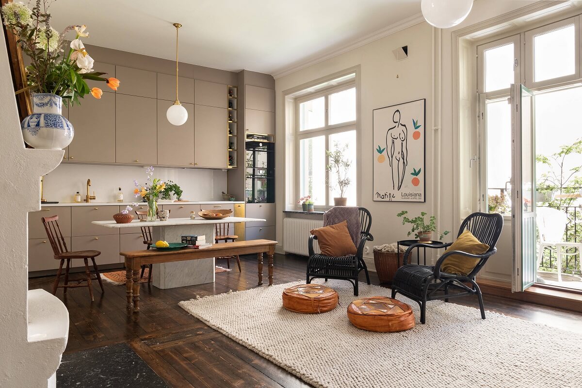 A Classic Maisonette Home in Stockholm 1 open-plan-living-room-dark-wooden-floor-white-rug-nordroom