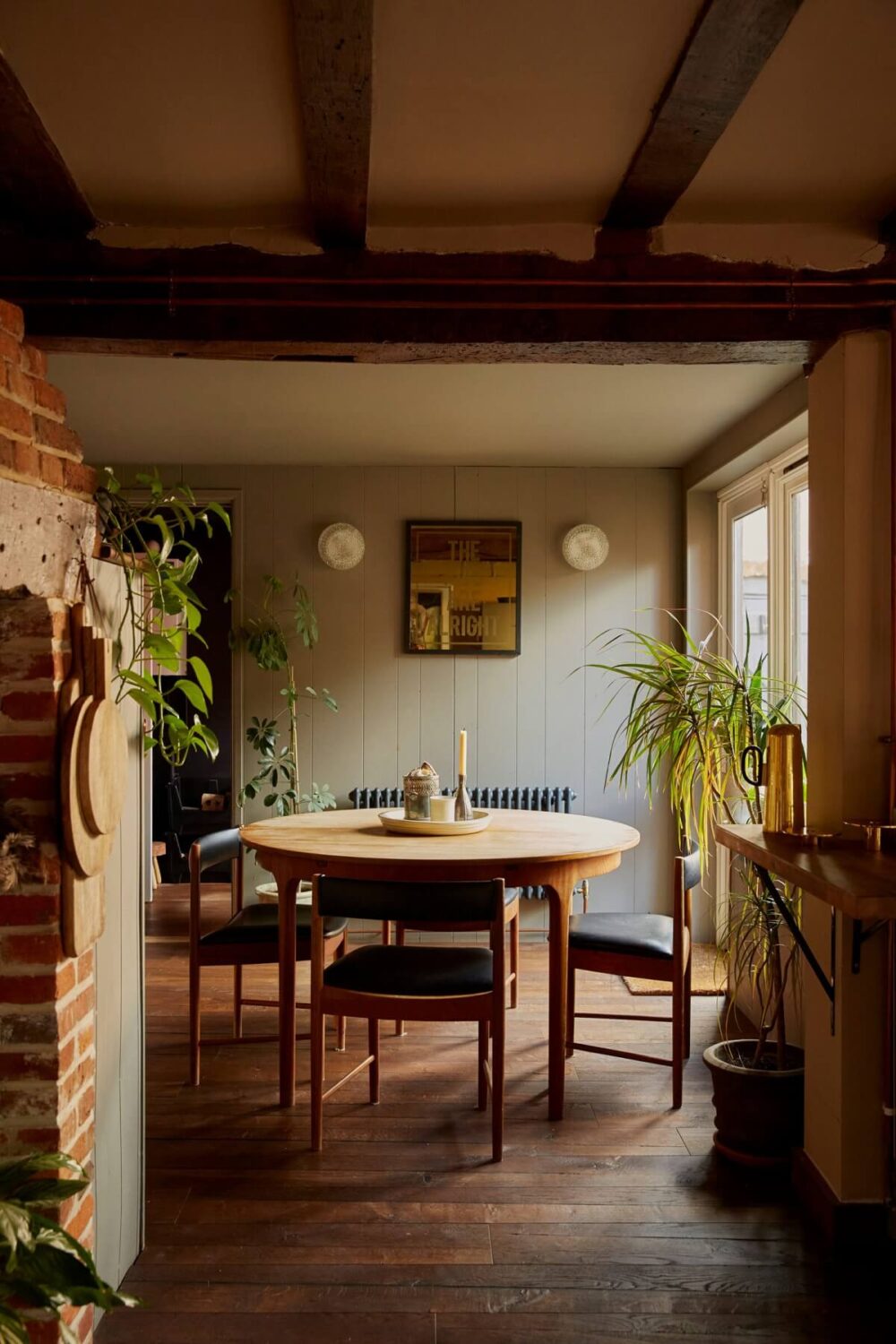 Best of 2023: Dining Rooms 13 round-dining-table-wooden-floor-exposed-beams-nordroom