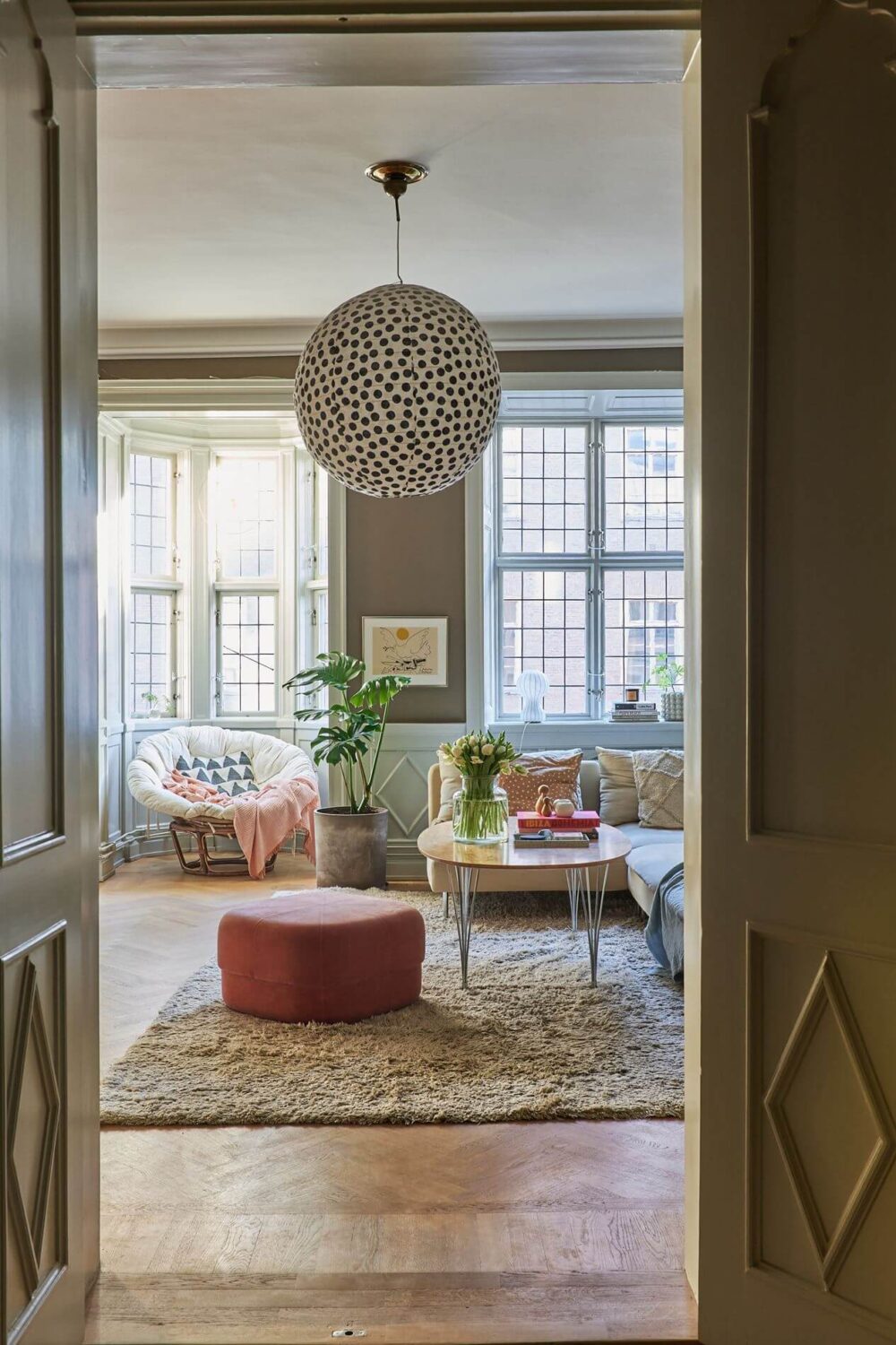 Light Brown Walls in a 17th Century Apartment in Sweden 1 double-wooden-doors-living-room-wooden-floor-nordroom