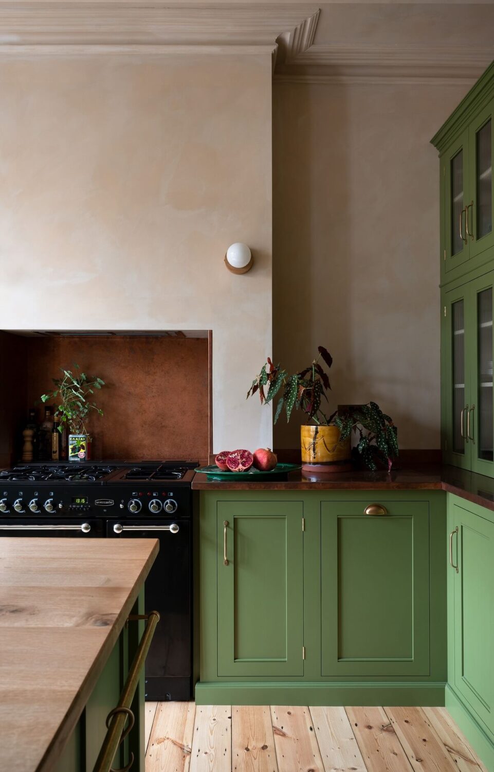 A Green deVOL Kitchen Combined with Plaster Pink Walls 3 green-kitchen-cabinets-wooden-floor-nordroom