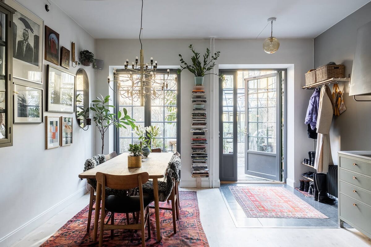 A Swedish Townhouse with a Light Green Kitchen 1 kitchen-dining-room-gallery-wall-nordroom