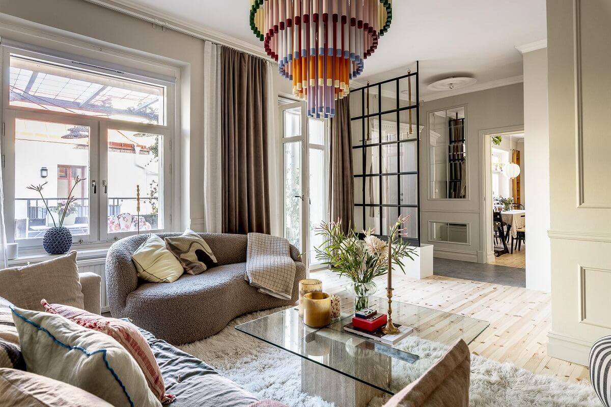 A Swedish Maisonette with a Blue Kitchen and Wallpaper 5 scandinavian-living-room-steel-glass-dividing-wall-nordroom