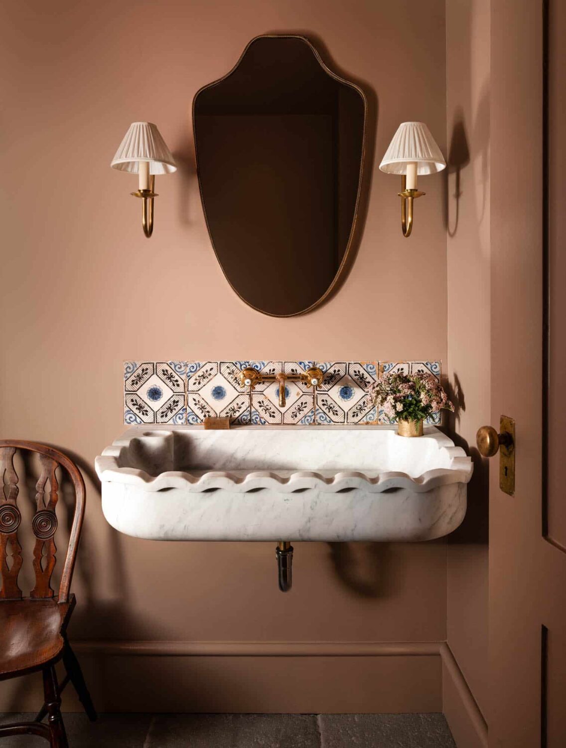A Cozy Pied-à-Terre with Slanted Ceilings and Wallpaper 24 bathroom-powder-pink-walls-tiles-nordroom