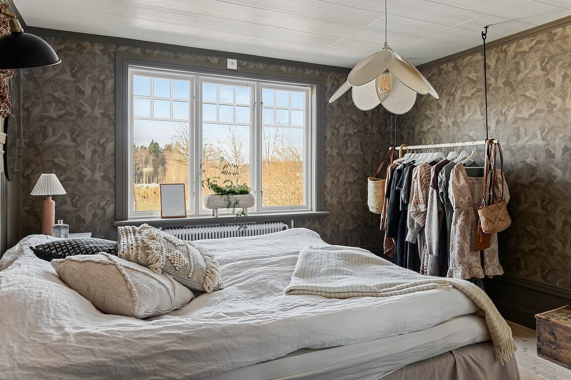 An Idyllic Family Home in the Swedish Countryside 16 bedroom-wallpaper-clothing-rack-swedish-country-house-nordroom