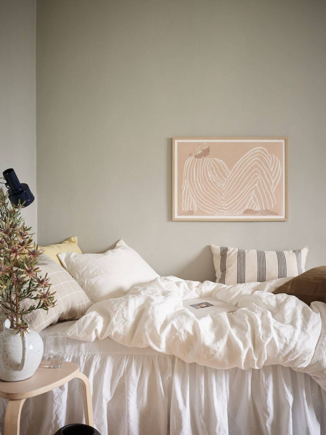 A Small Studio Apartment with Gray Walls 6 cozy-studio-apartment-gray-walls-white-bedding-nordroom