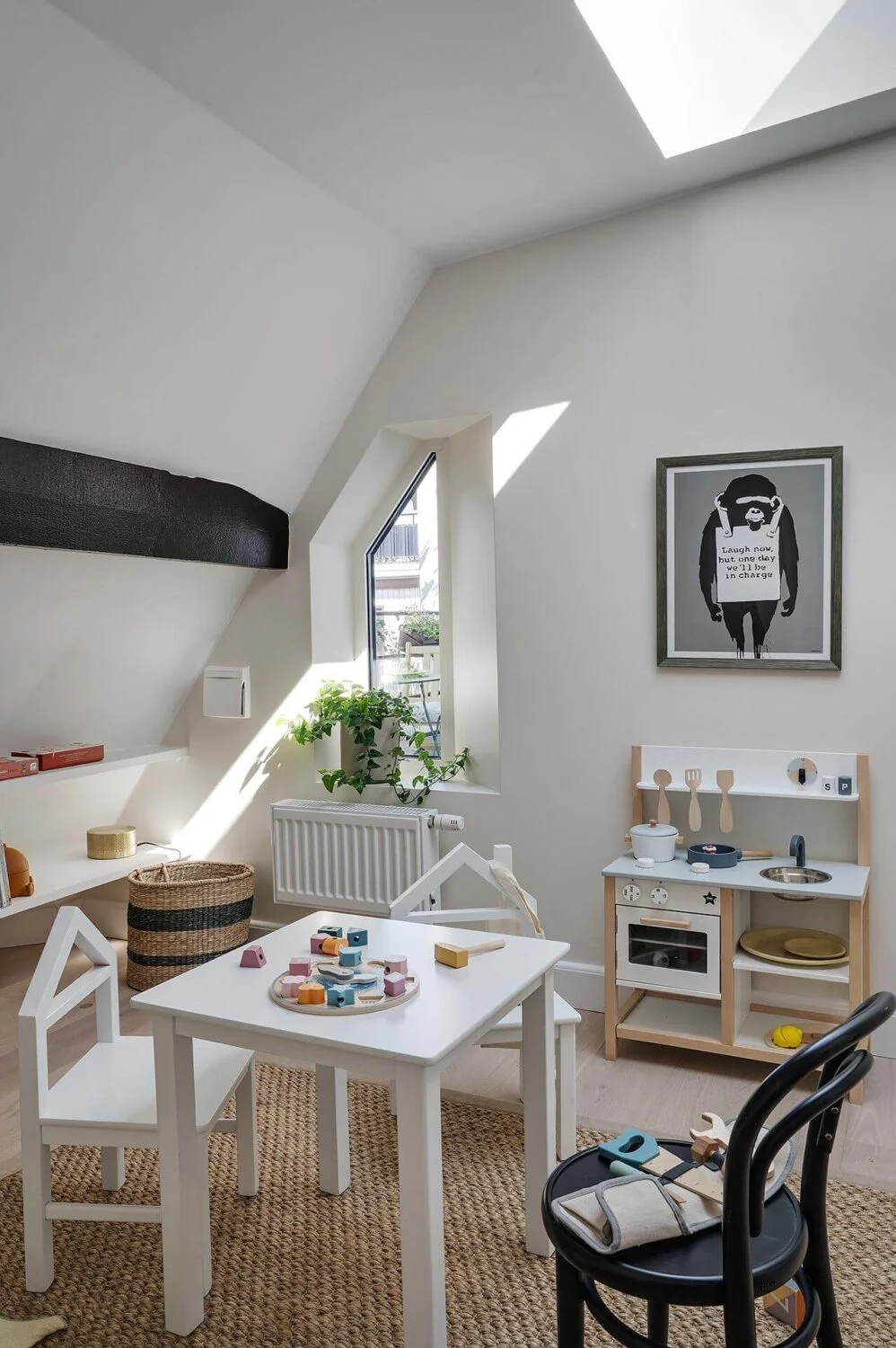 A Modern Scandinavian Attic Apartment 26 kids-bedroom-white-walls-skylight-slanted-ceiling-nordroom