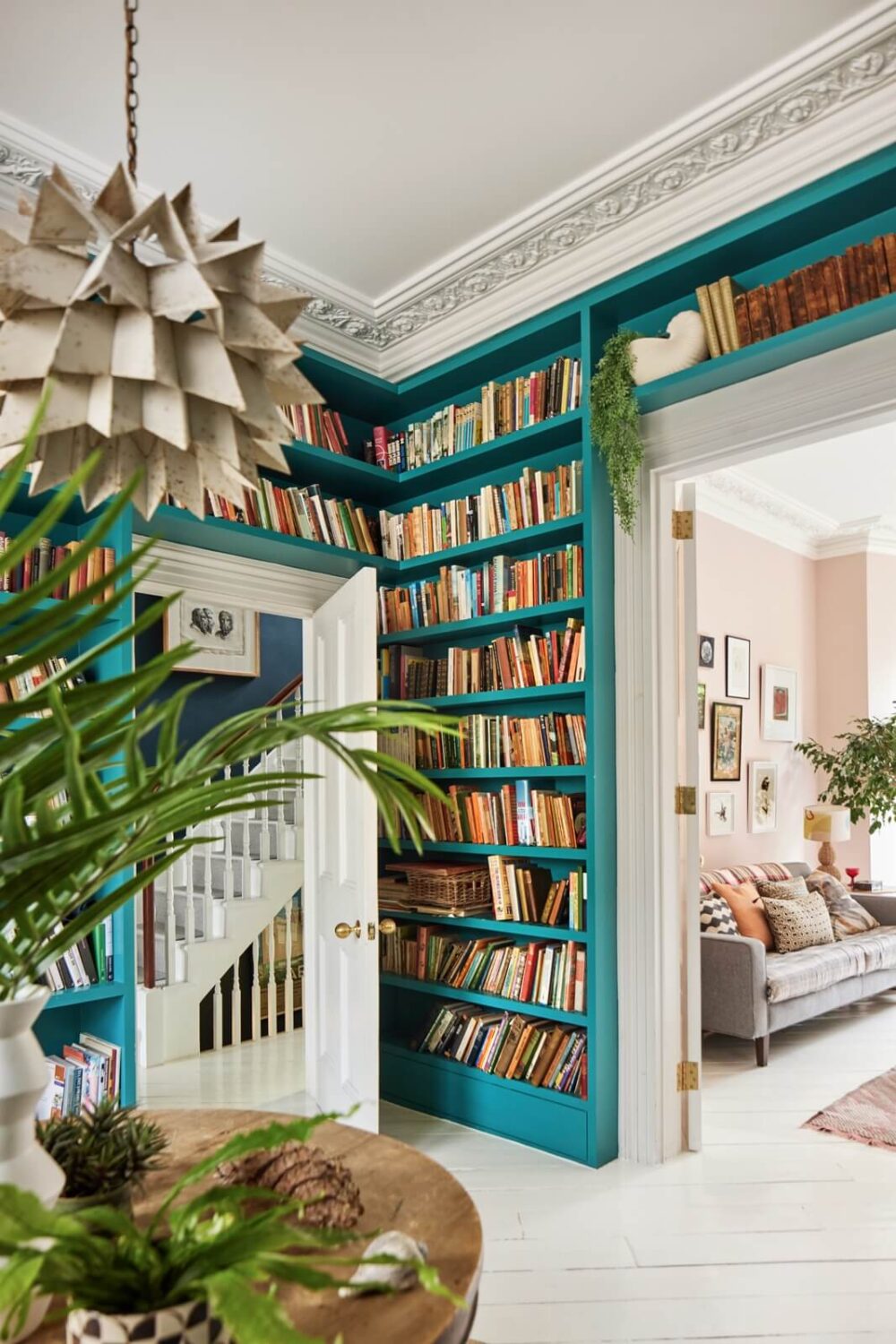 36 Home Library Ideas That Are A Book-Lover's Dream 2 reading-room-teal-bookcases-nordroom
