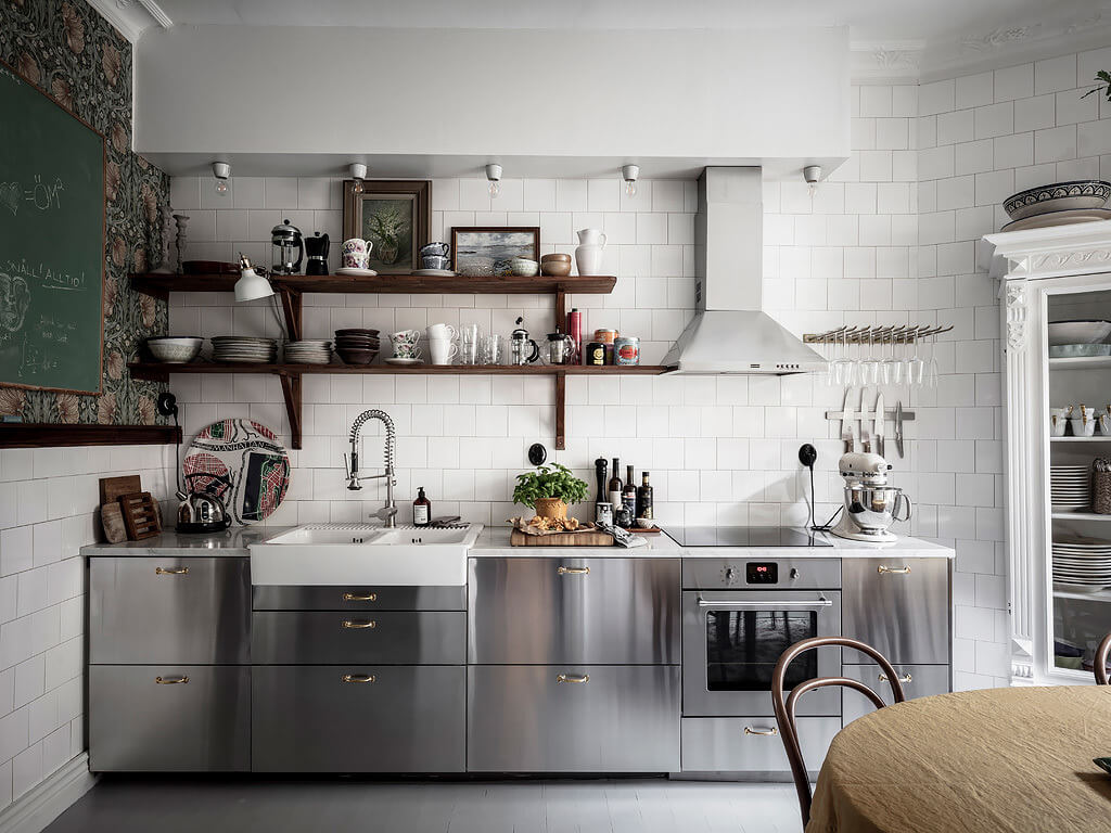 stainless steel kitchen green wiliam morris wallpaper nordroom A Scandi Home with Stainless Steel Kitchen and Wallpaper
