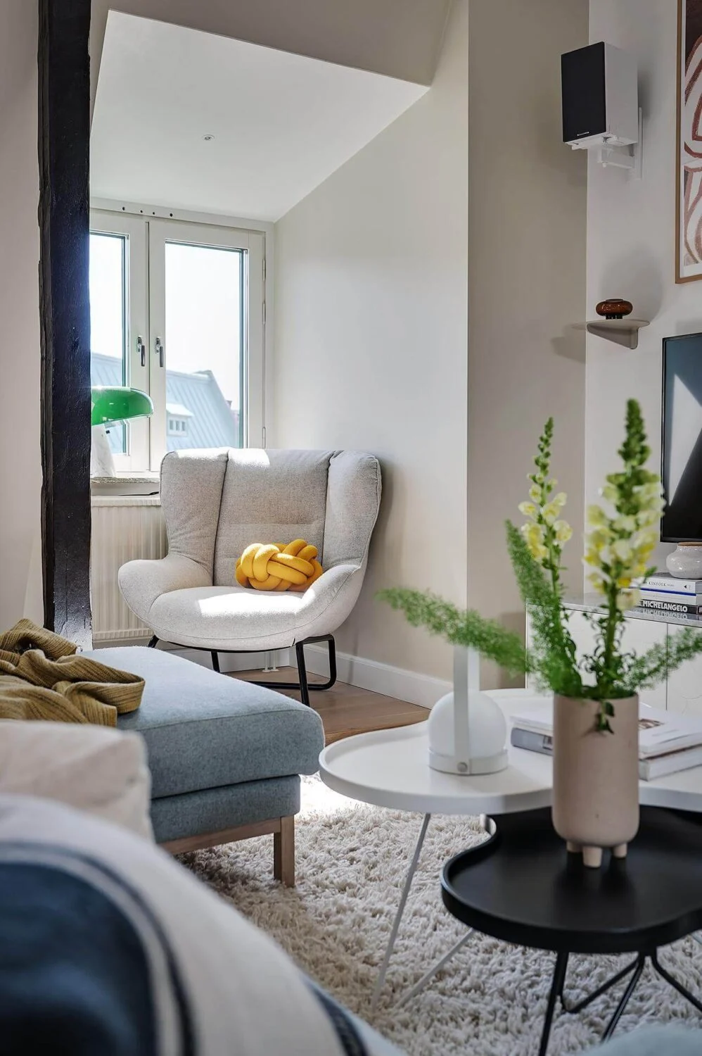 A Modern Scandinavian Attic Apartment 12 window-seat-reading-nook-modern-nordic-attic-apartment-nordroom