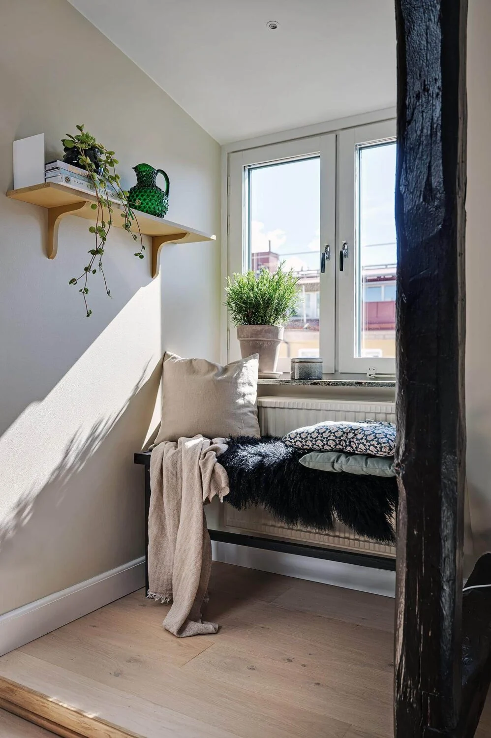 A Modern Scandinavian Attic Apartment 6 window-seat-scandinavian-attic-apartment-nordroom