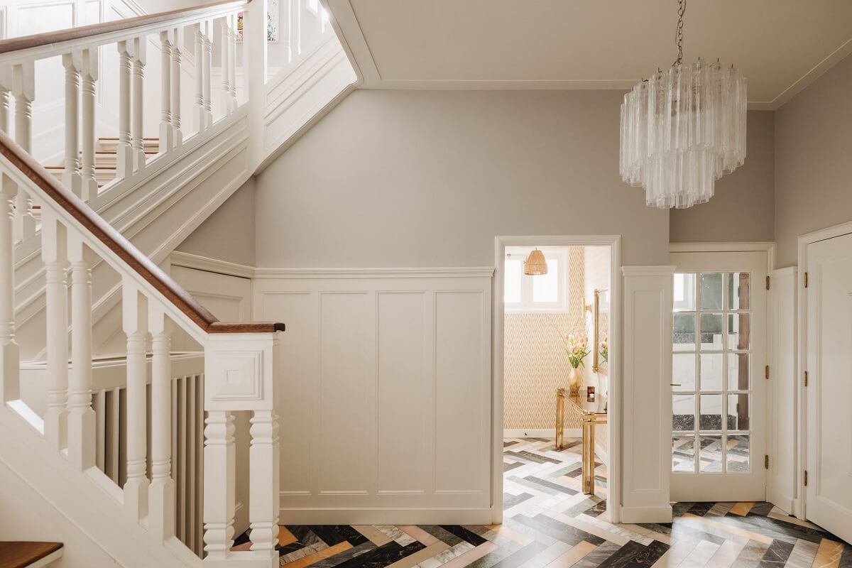 A Grand Renovated Family Home in Amsterdam 11 hallway-colorful-marble-floor-herringbone-pattern-nordroom